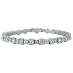 Oval Cut Diamond Tennis Bracelet in 18K White Gold (10.64ct VVS) by Arnav