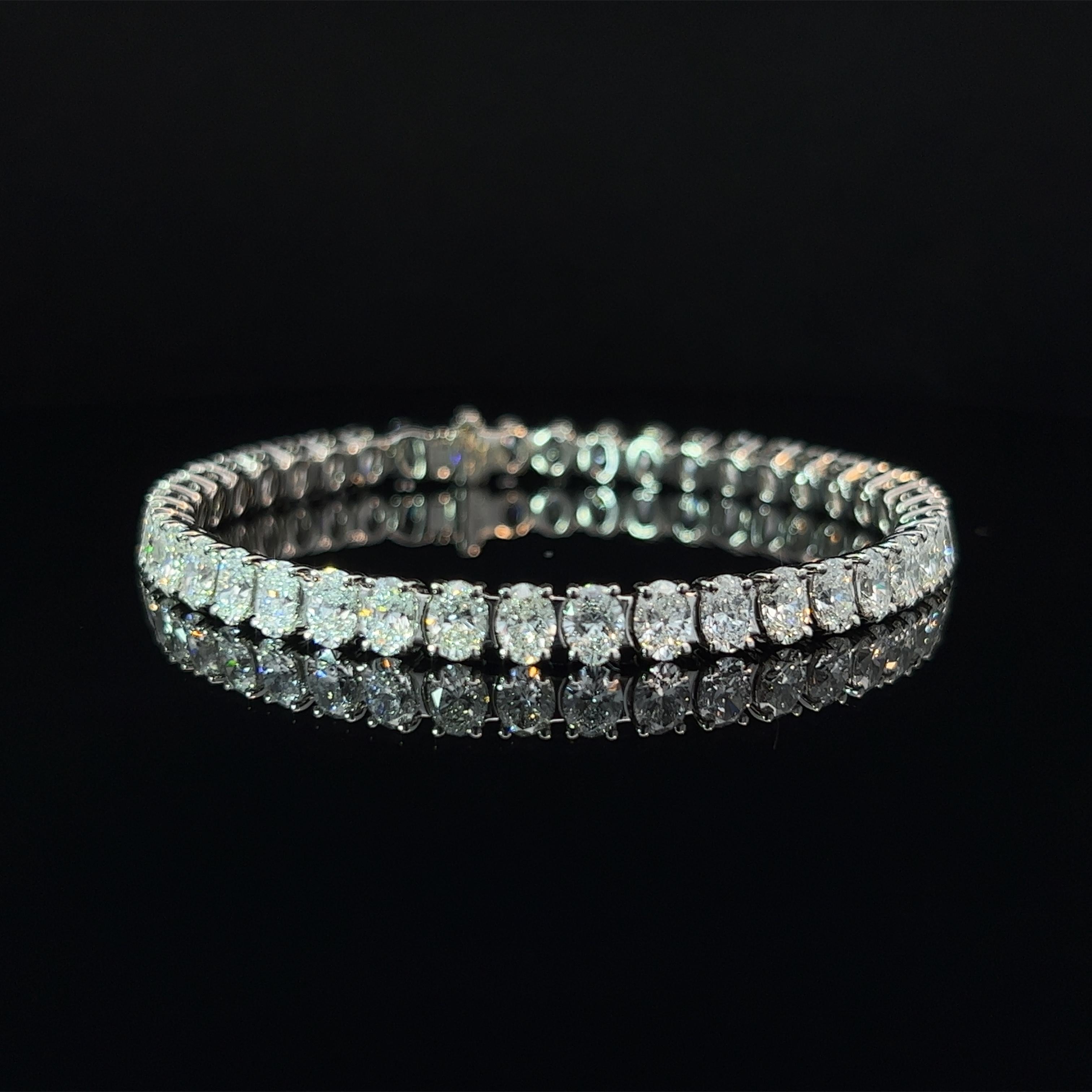 Diamond Shape: Oval Cut 
Total Diamond Weight: 13.1ct
Individual Diamond Weight: .33ct
Color/Clarity: FG VVS  
Metal: 950 Platinum
Metal Weight: 22.64g 

Key Features:

Oval-Cut Diamonds: The centerpiece of this bracelet features a dazzling array of