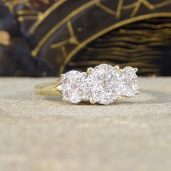Oval Cut Diamond Three Stone Illusion Cluster Ring in Yellow Gold