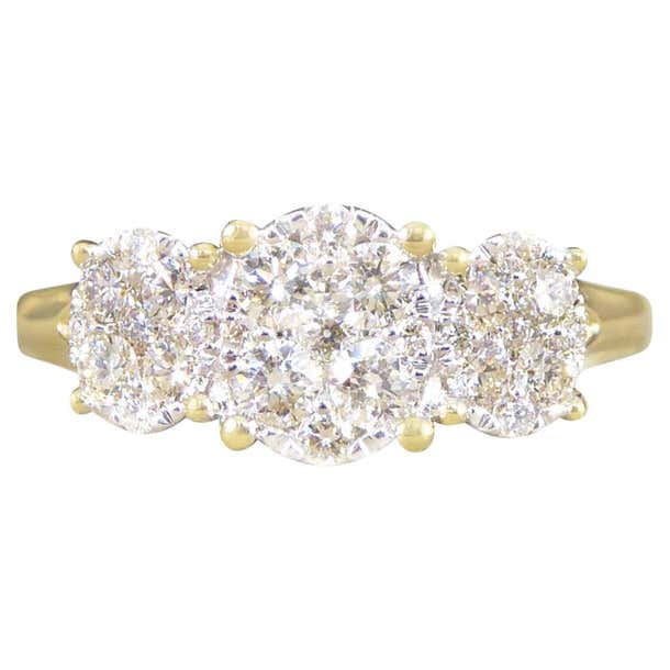 Oval Cut Diamond Three Stone Illusion Cluster Ring in Yellow Gold For ...