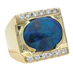 Oval Cut East West Black Opal Cocktail Ring with Diamonds 14 Karat Yellow Gold
