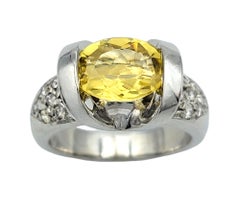 Oval Cut East-West Yellow Beryl and Pavé Diamond Ring in 14 Karat White Gold
