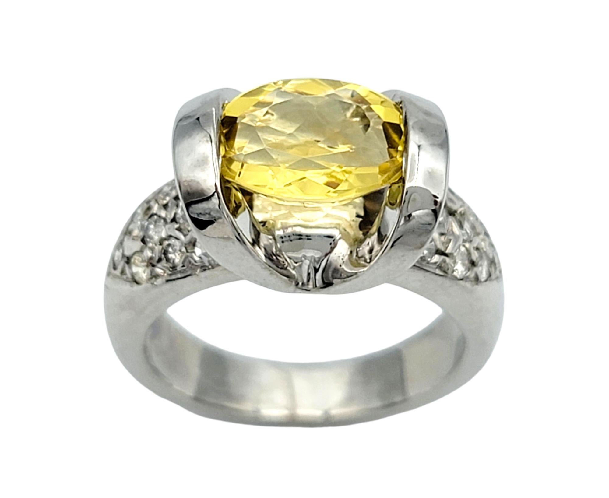 Contemporary Oval Cut East-West Yellow Beryl and Pavé Diamond Ring in 14 Karat White Gold For Sale
