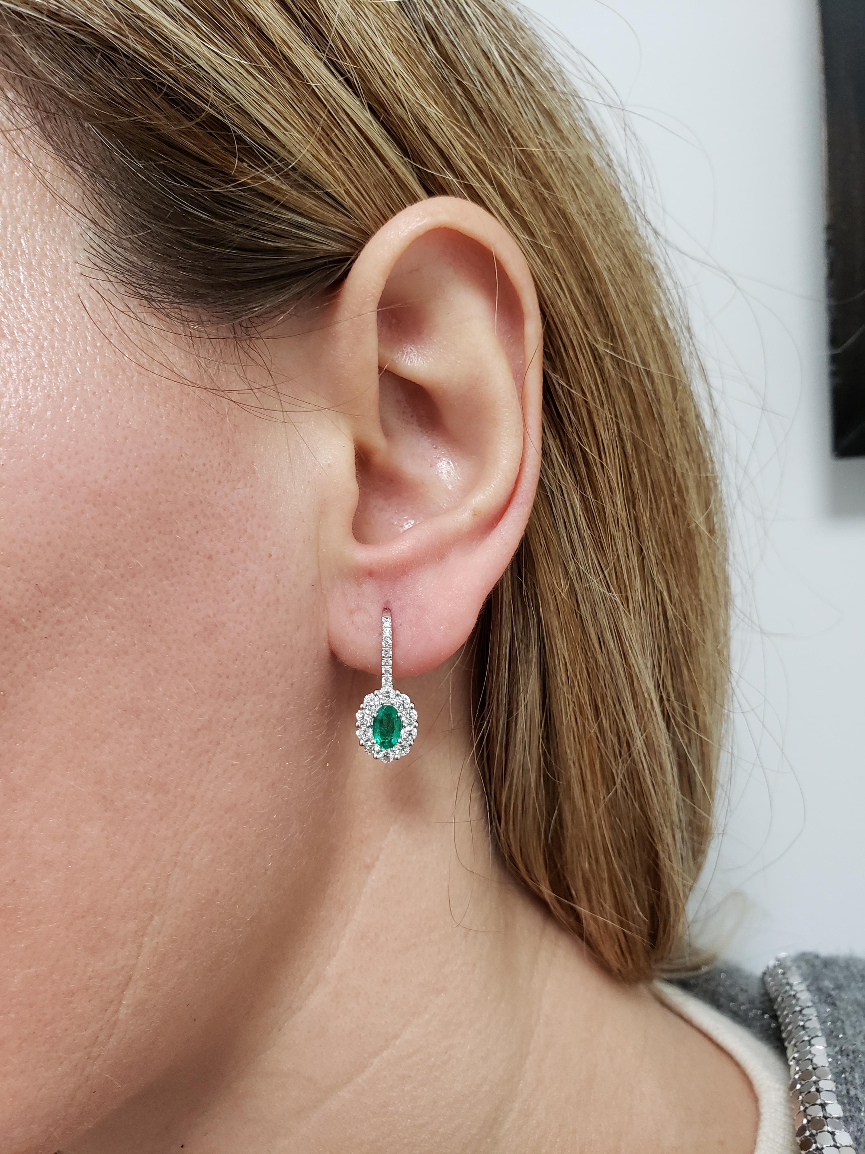 Roman Malakov 0.78 Carat Oval Cut Emerald and Diamond Halo Lever-Back Earrings In New Condition For Sale In New York, NY