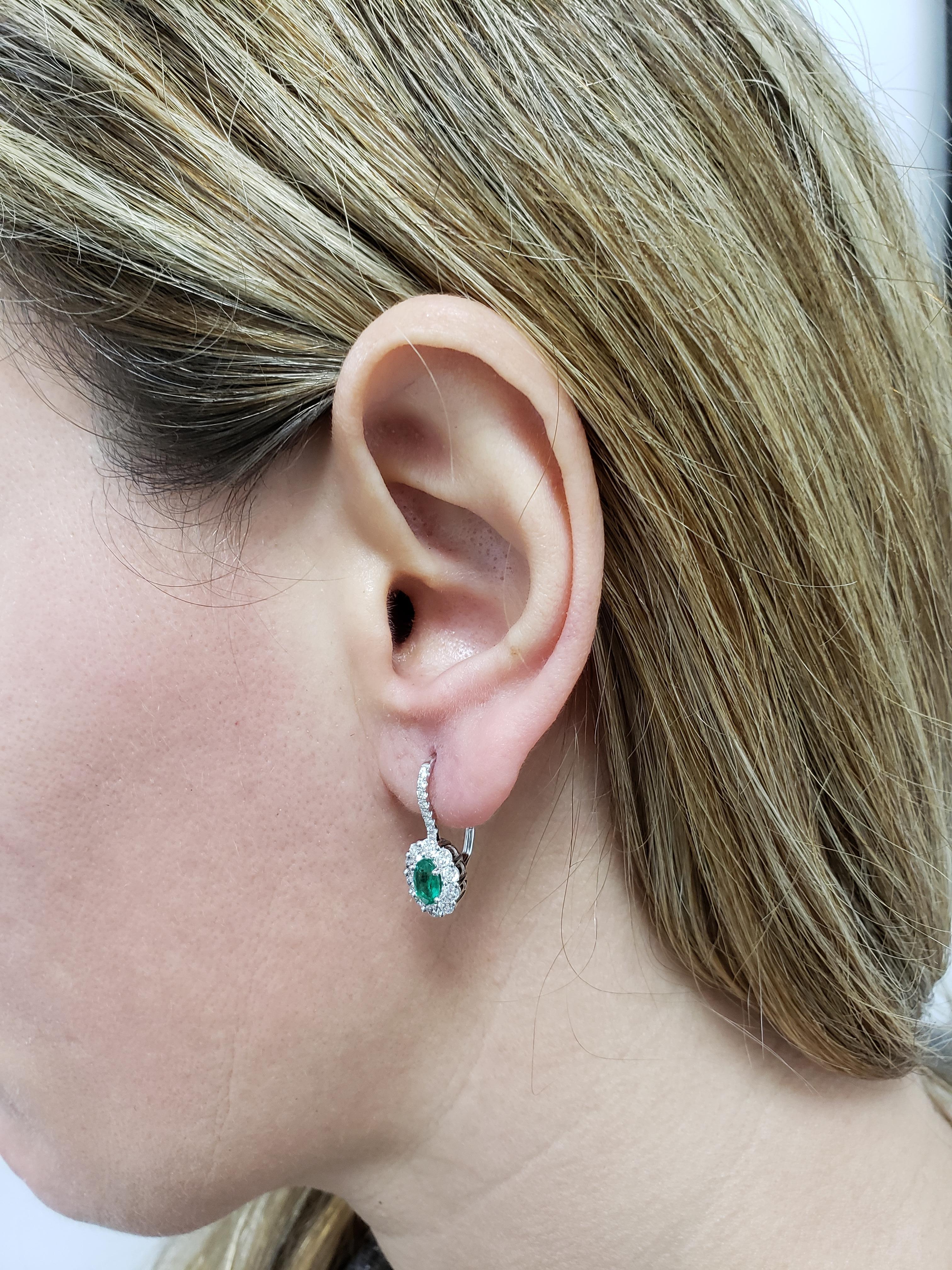 Women's Roman Malakov 0.78 Carat Oval Cut Emerald and Diamond Halo Lever-Back Earrings For Sale