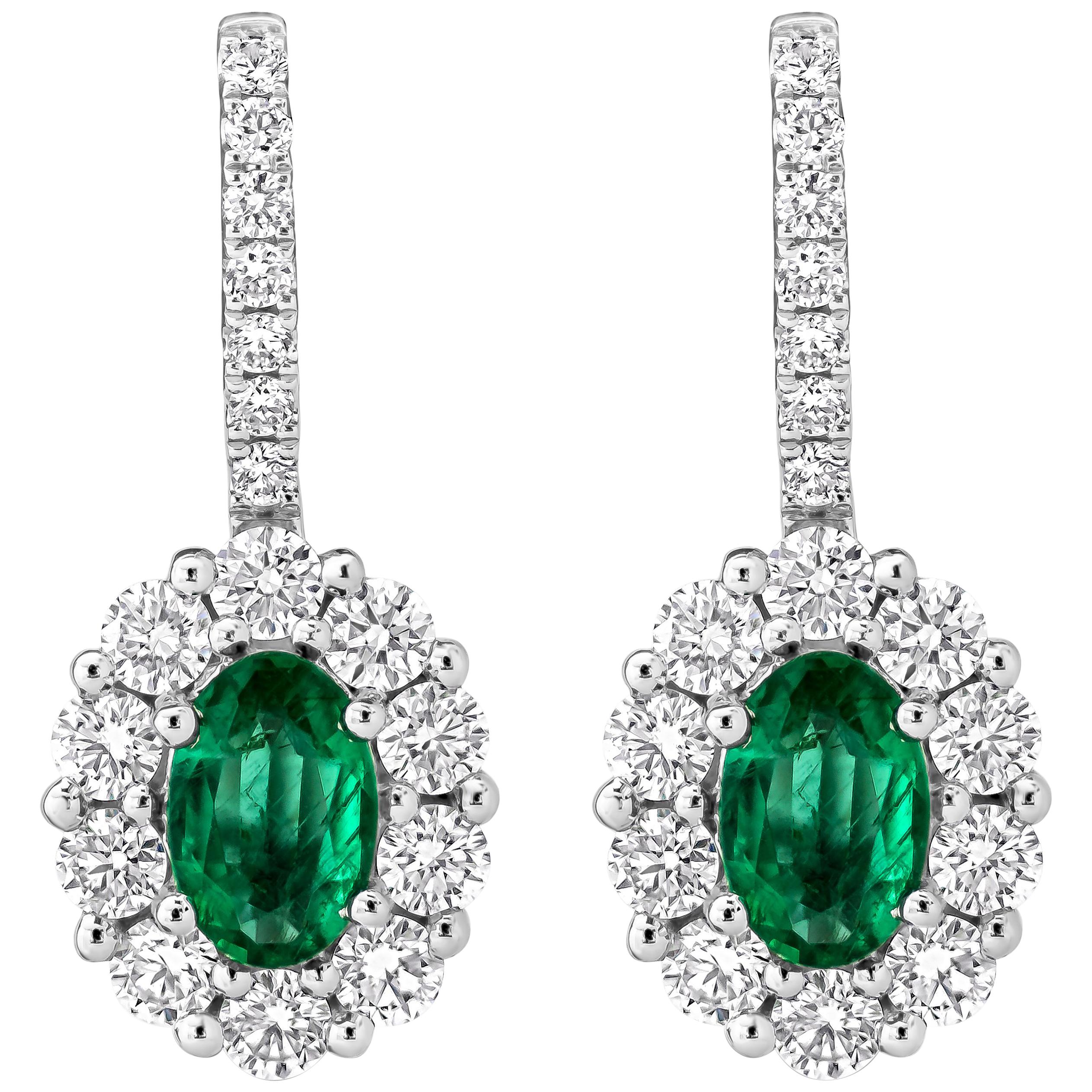 Roman Malakov 0.78 Carat Oval Cut Emerald and Diamond Halo Lever-Back Earrings For Sale