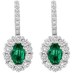 Roman Malakov 0.78 Carat Oval Cut Emerald and Diamond Halo Lever-Back Earrings