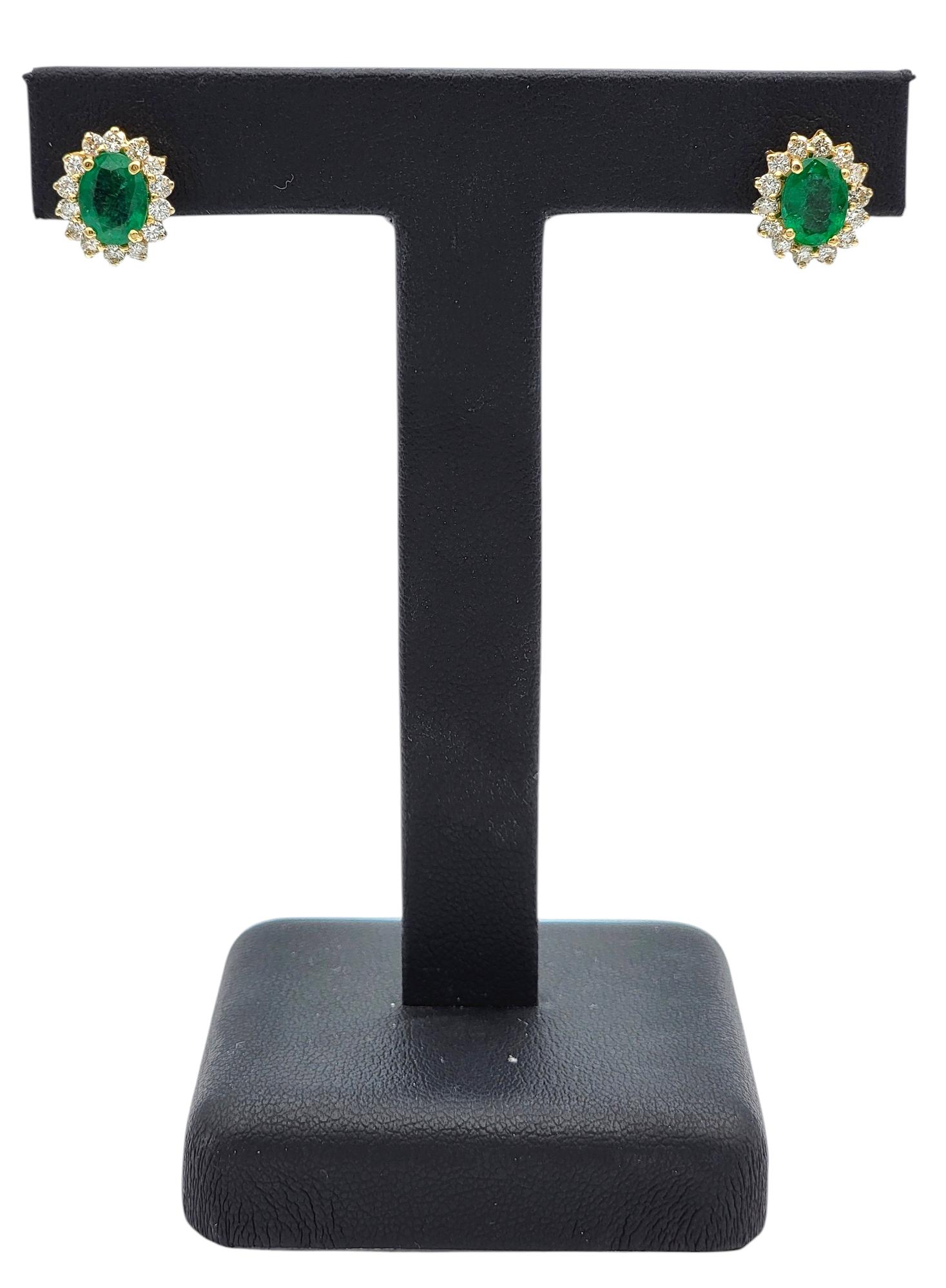 Oval Cut Emerald and Diamond Halo Stud Earrings in Polished 14 Karat Yellow Gold For Sale 5
