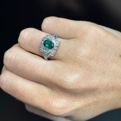 Oval Cut Emerald And Diamond Ring