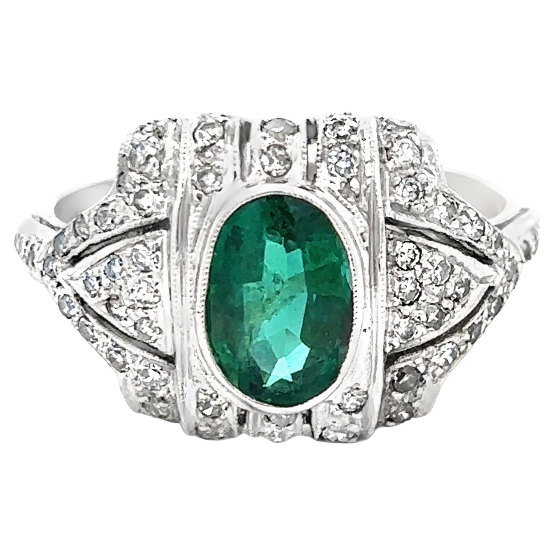 Oval Cut Emerald And Diamond Ring