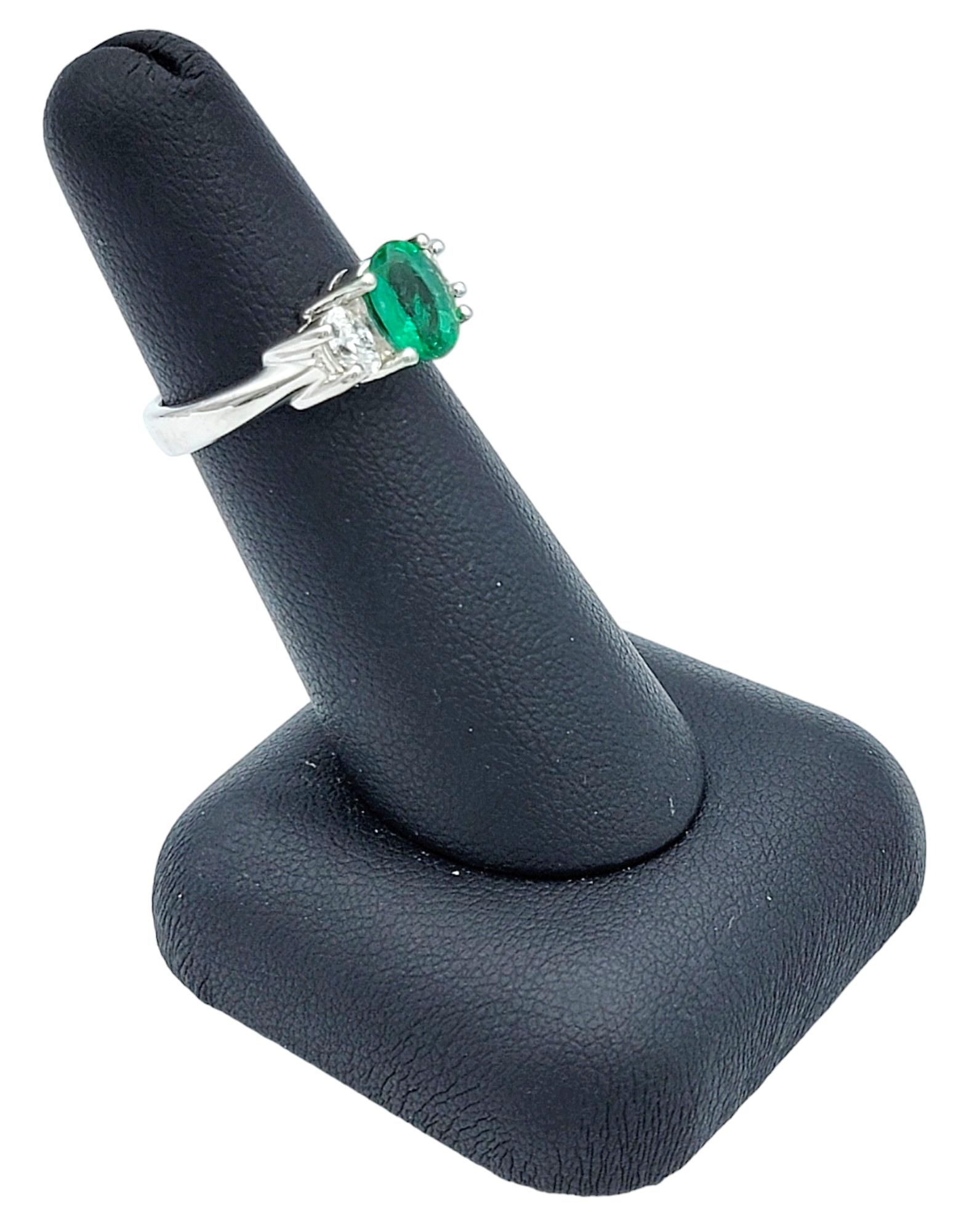 Oval Cut Emerald and Diamond Three Stone Ring in Polished 14 Karat White Gold For Sale 6