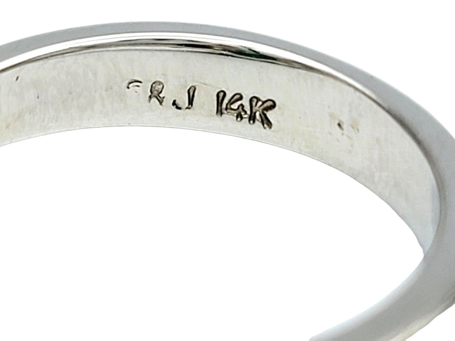 Oval Cut Emerald and Diamond Three Stone Ring in Polished 14 Karat White Gold For Sale 2