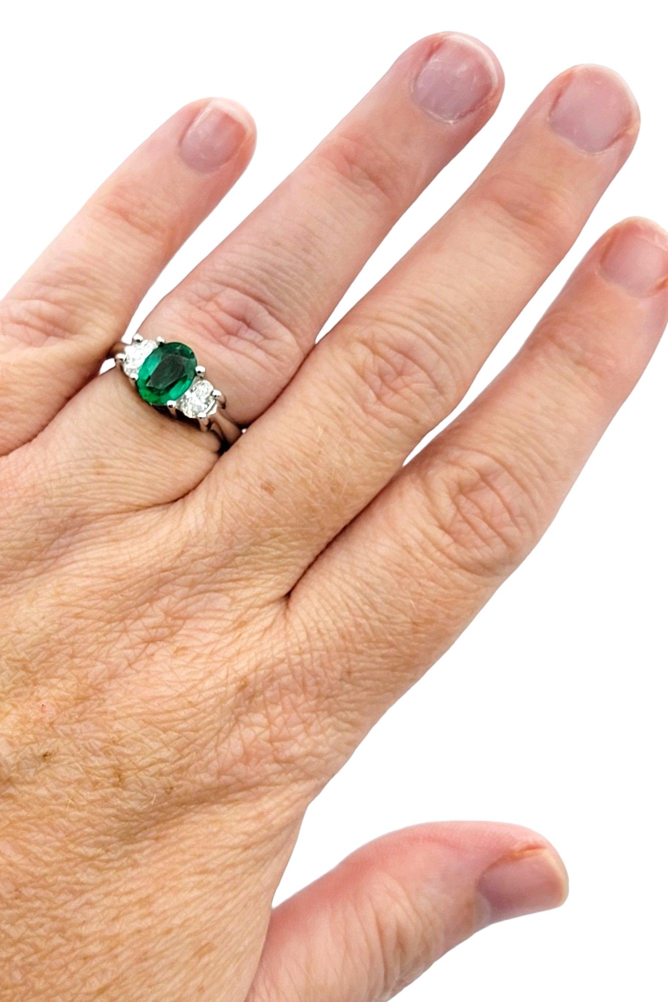Oval Cut Emerald and Diamond Three Stone Ring in Polished 14 Karat White Gold For Sale 4