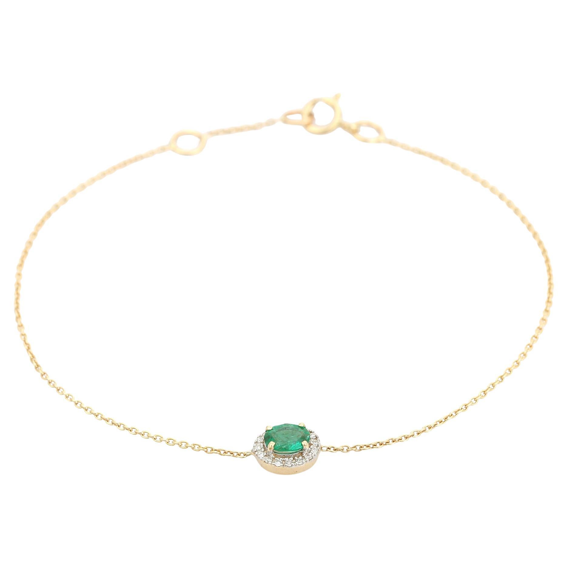 Bracciale a catena con smeraldo taglio ovale e diamanti a raggiera in oro giallo 14K