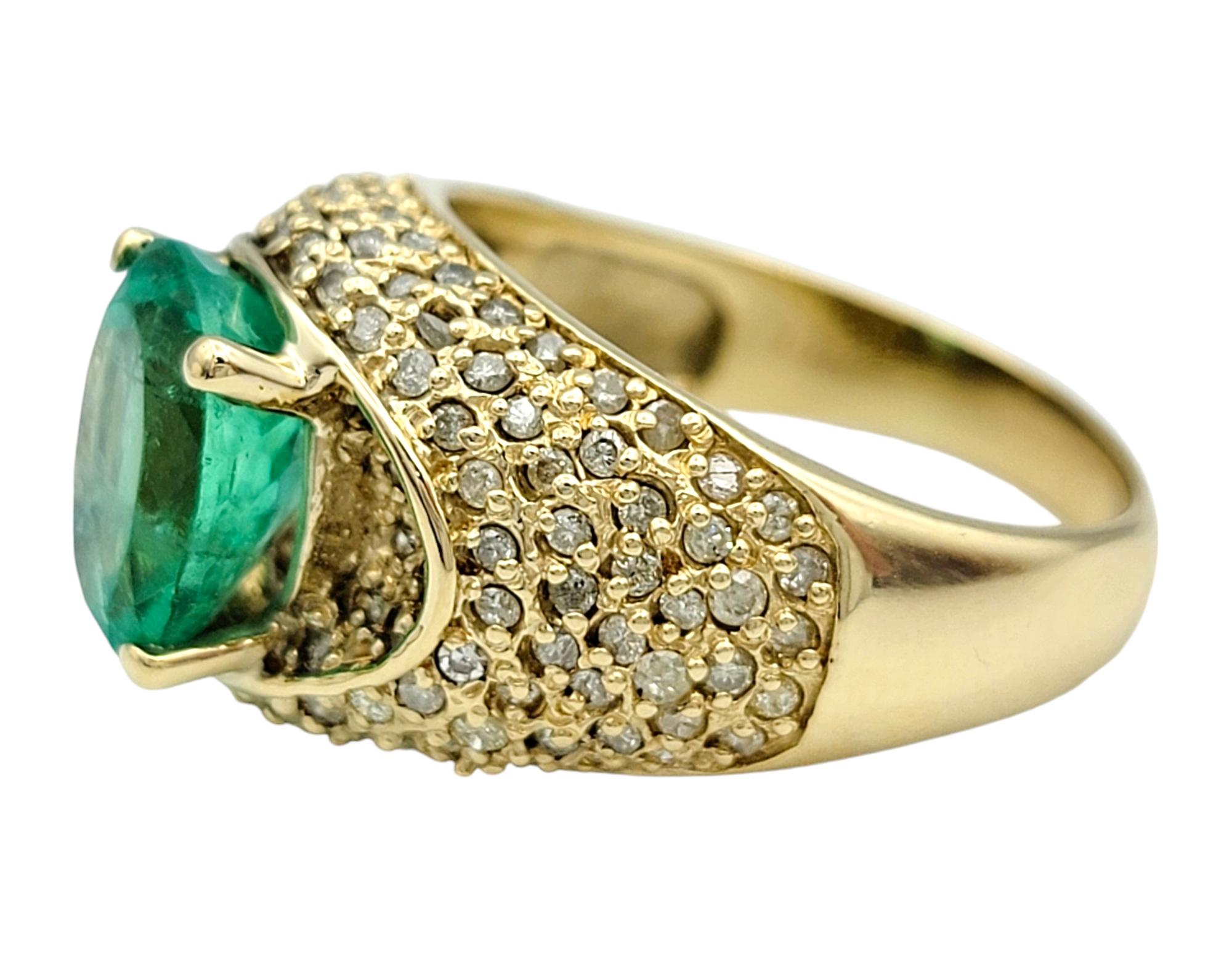 Oval Cut Emerald and Pave Diamond Domed Band Ring in 14 Karat Yellow Gold In Good Condition For Sale In Scottsdale, AZ