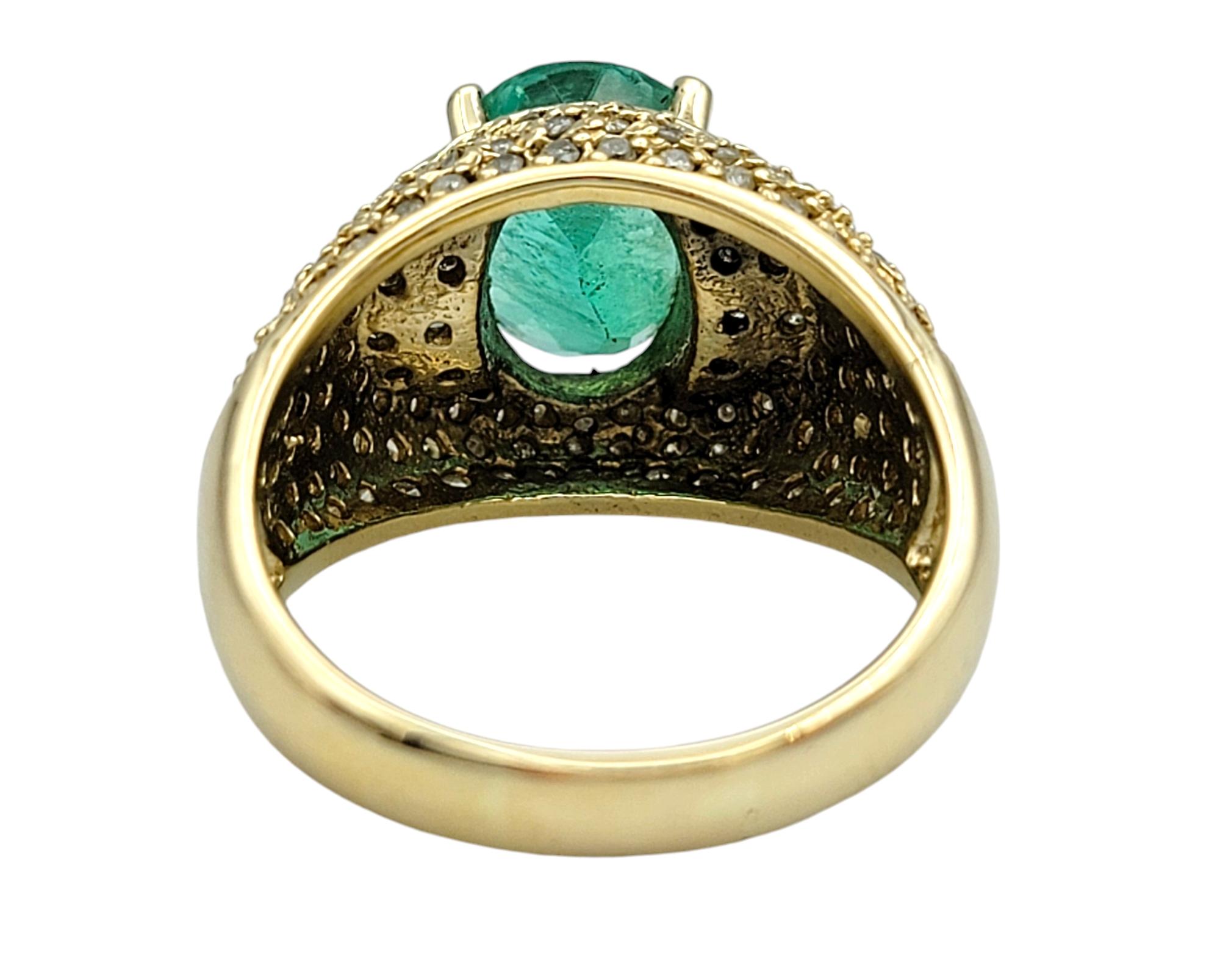 Women's Oval Cut Emerald and Pave Diamond Domed Band Ring in 14 Karat Yellow Gold For Sale