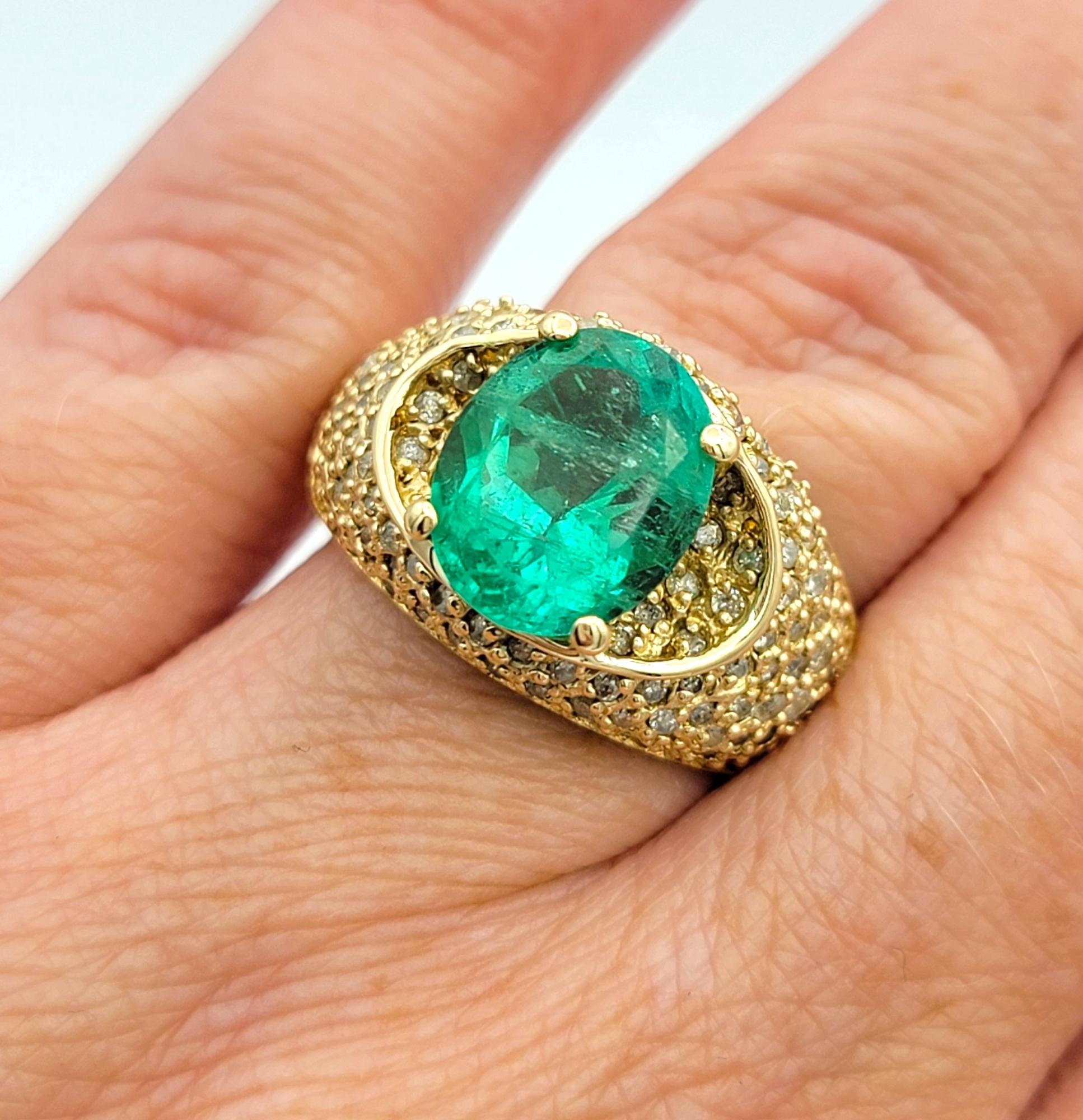 Oval Cut Emerald and Pave Diamond Domed Band Ring in 14 Karat Yellow Gold For Sale 2