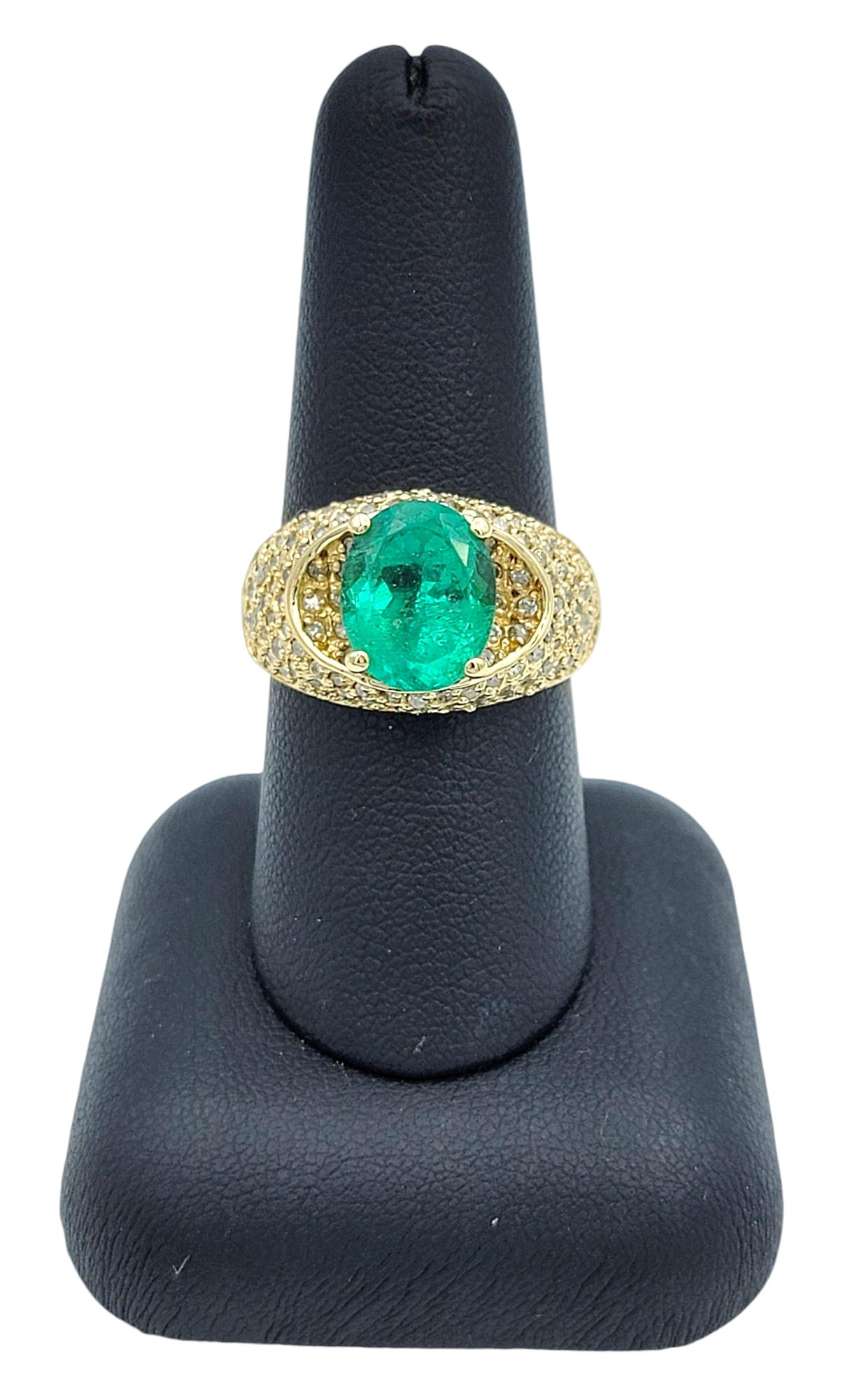 Oval Cut Emerald and Pave Diamond Domed Band Ring in 14 Karat Yellow Gold For Sale 4