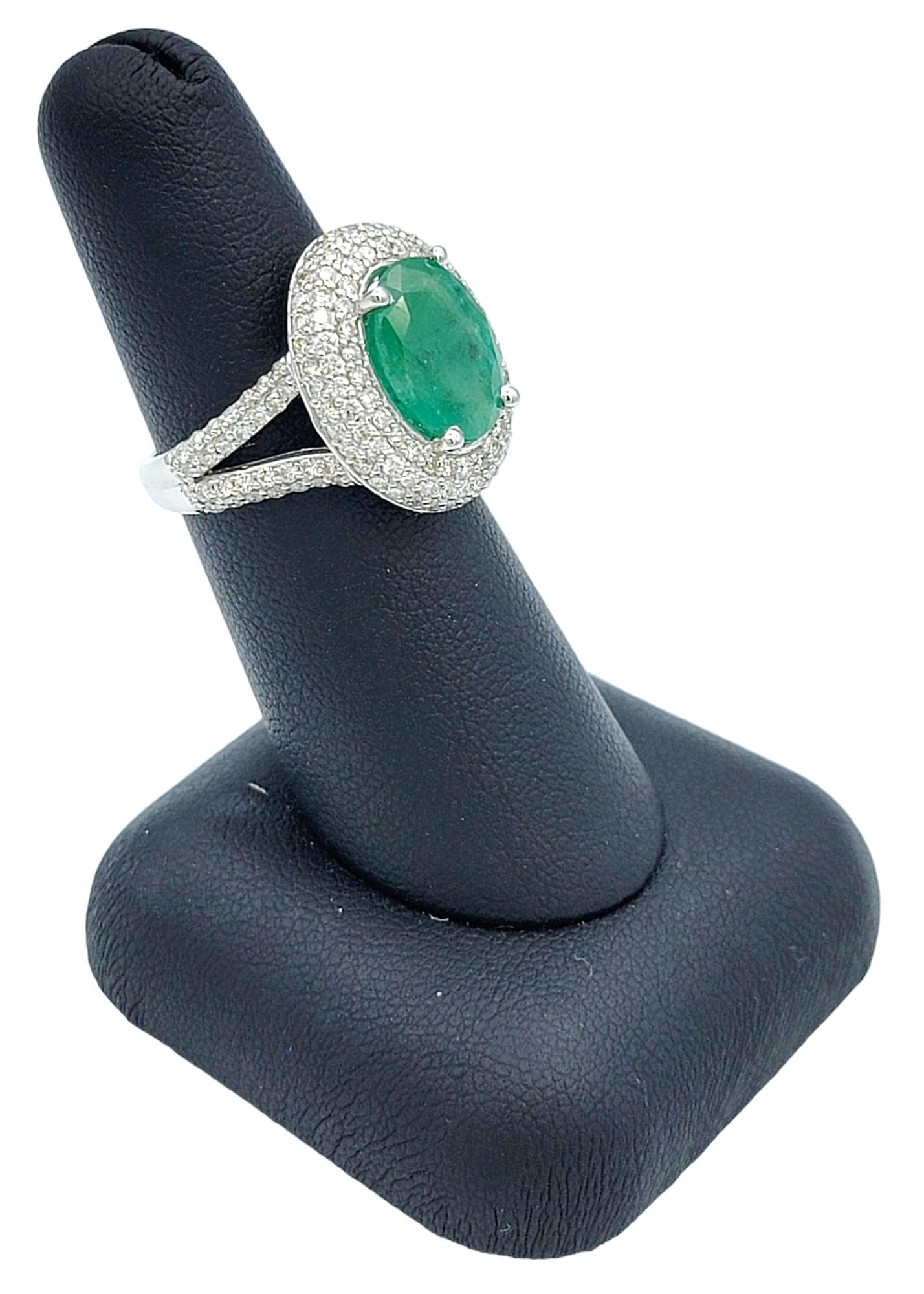Oval Cut Emerald and Pavé Diamond Double Halo Cocktail Ring 14 Karat White Gold For Sale 3
