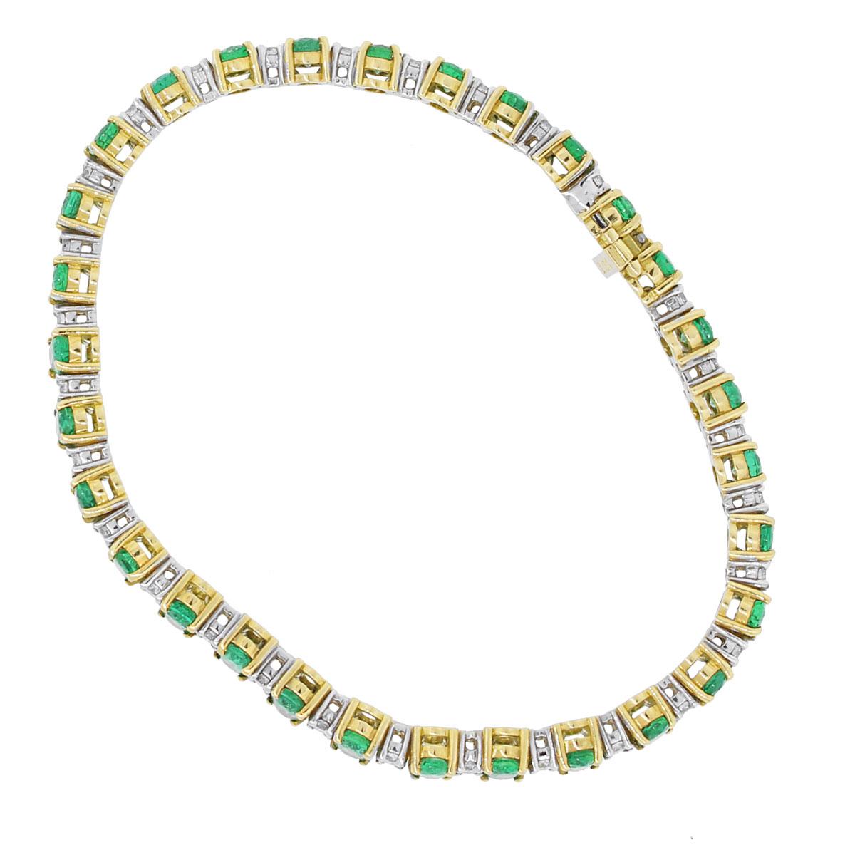Contemporary Oval Cut Emerald and Round Diamond Bracelet