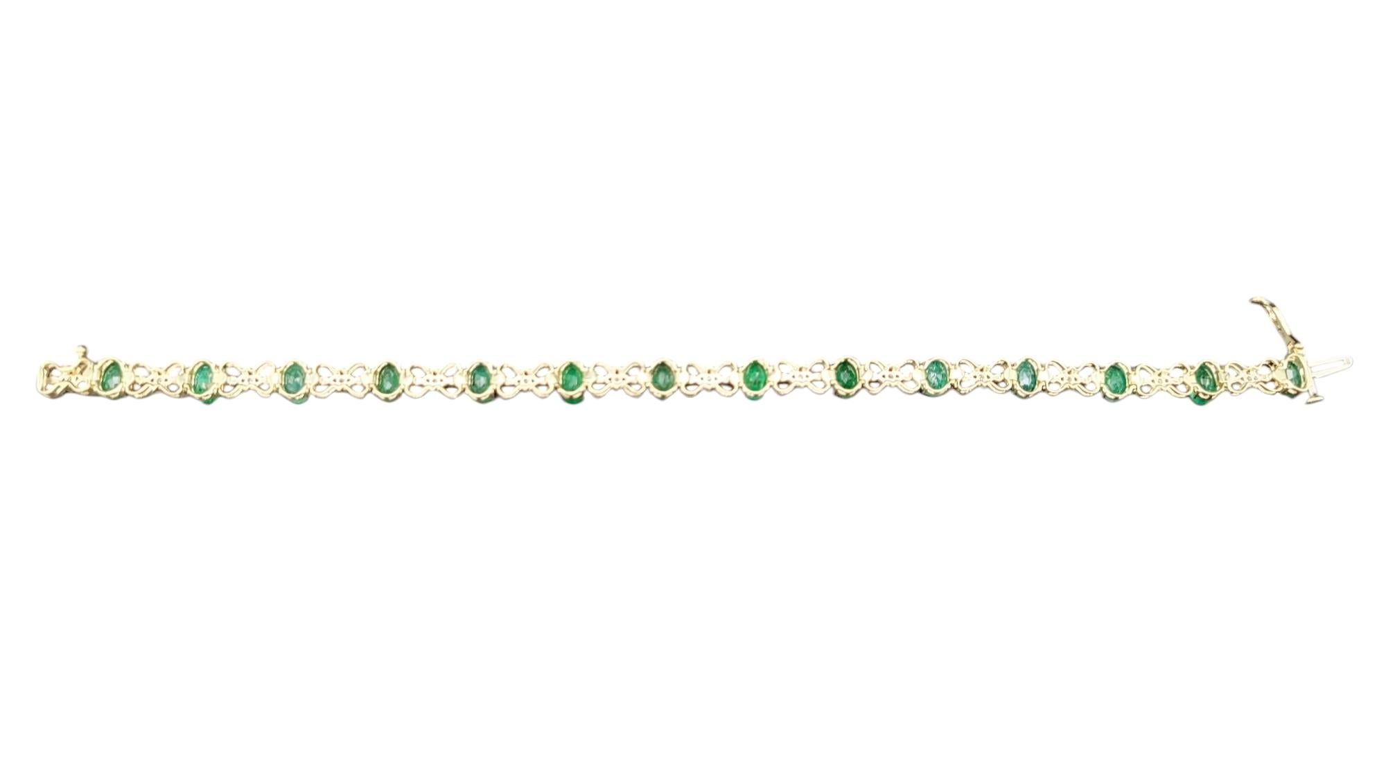 Contemporary Oval Cut Emerald and Round Diamond Tennis Bracelet Set in Two-Tone 14 Karat Gold For Sale