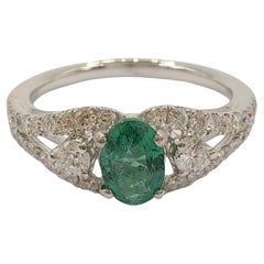 Oval-Cut Emerald Diamond Cluster Ring in 18k White Gold