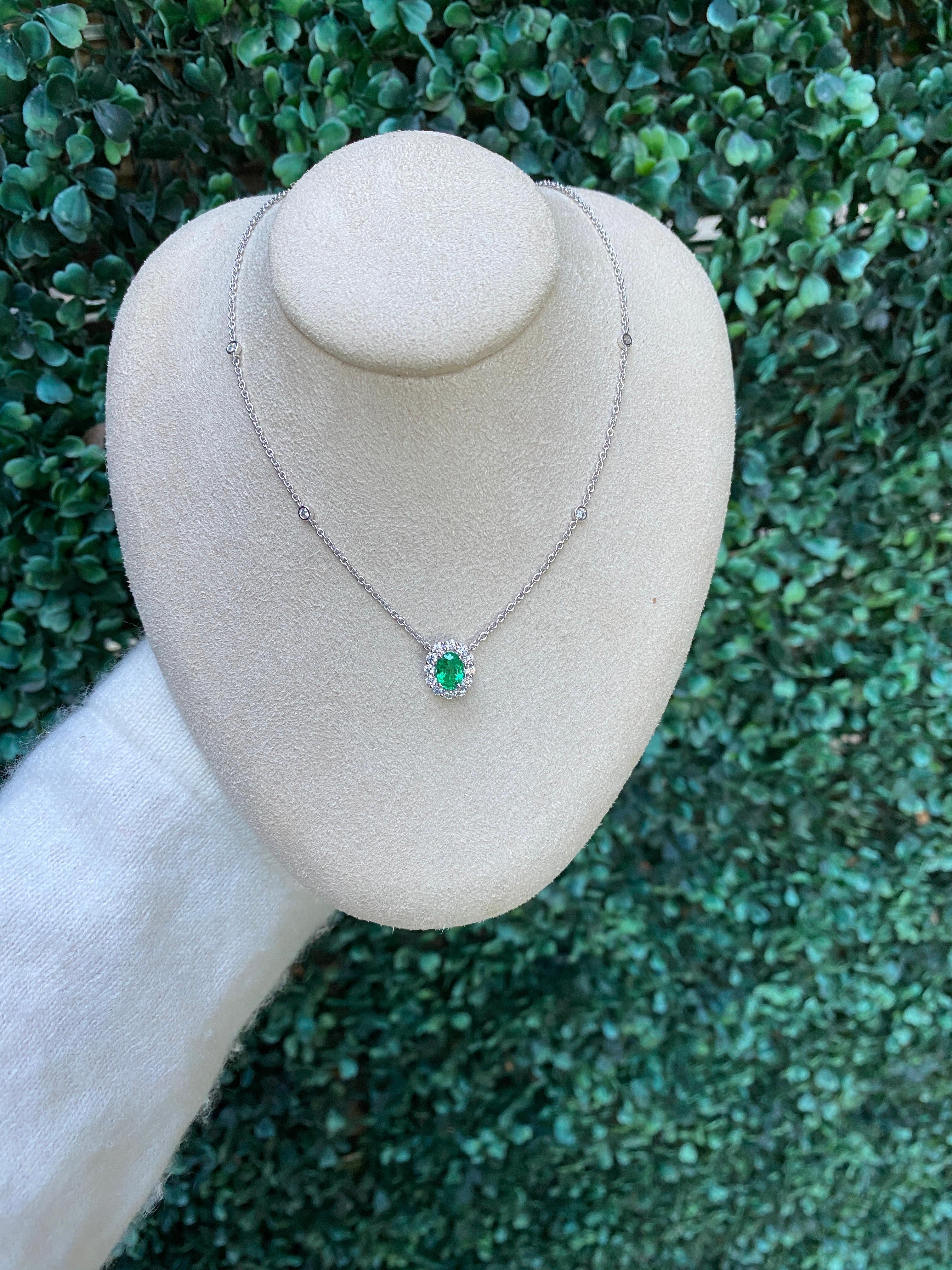 Oval Cut Emerald & Diamond Halo Pendant Necklace In New Condition For Sale In Houston, TX