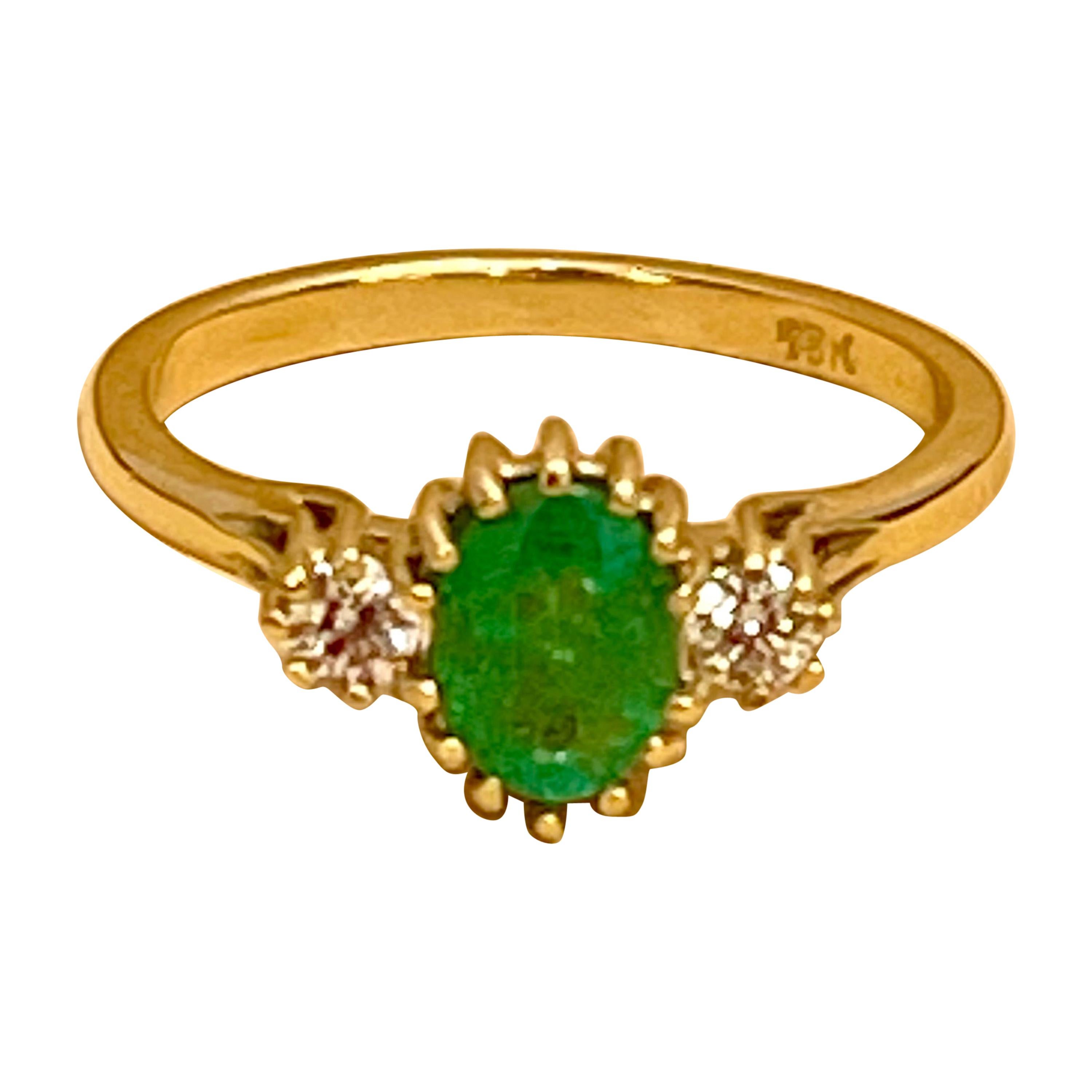 Oval Cut Emerald & Diamond Ring in 18 Karat Yellow Gold For Sale