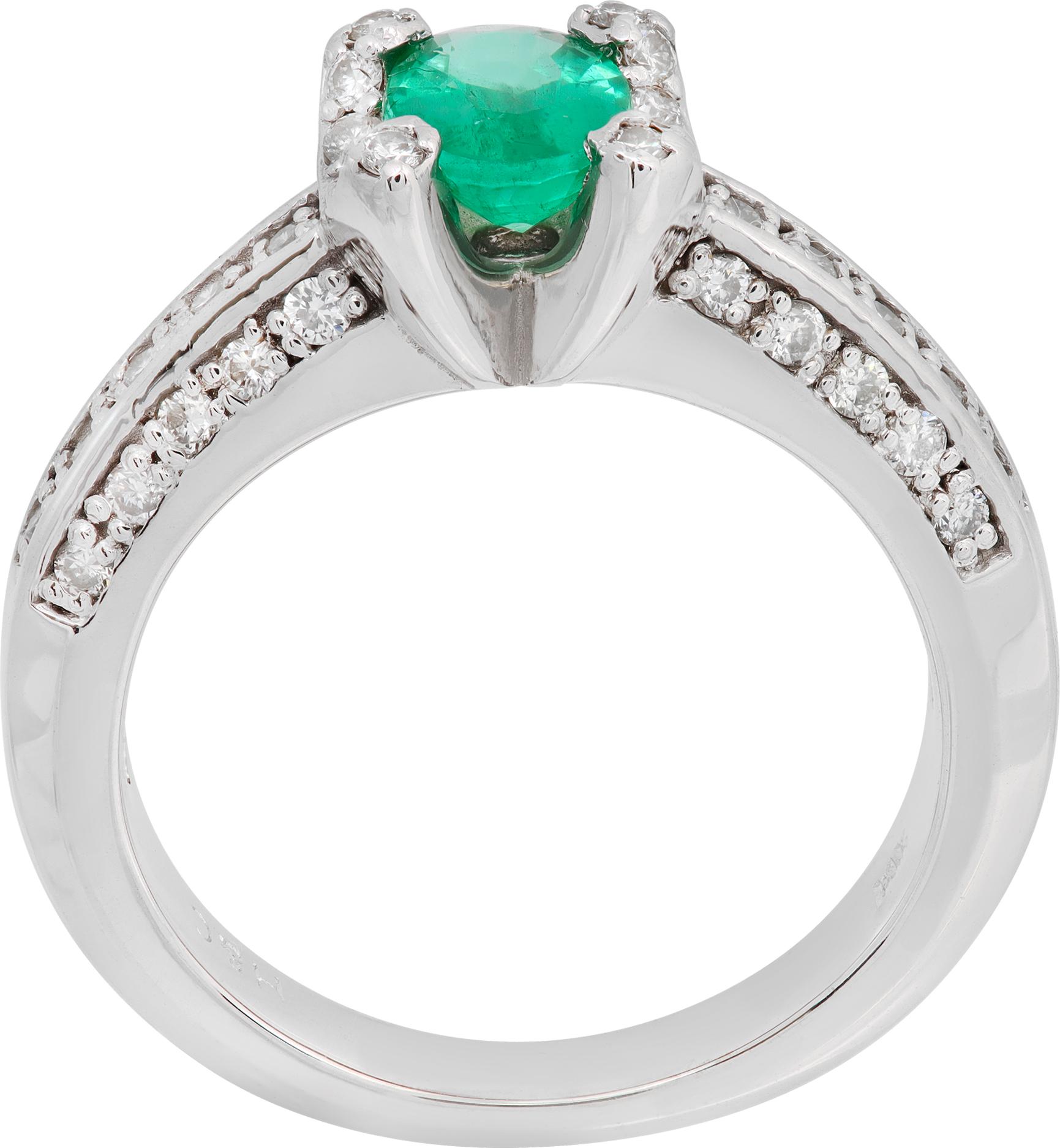 Stunning oval cut emerald and diamond ring In 14k white gold. Emerald approx. weight over 1.00 carat. Diamonds total approx. weight 0.75 carat, estimate G-H color, VS- SI clarity. Size 6.50

This Emerald ring is currently size 6.5 and some items can