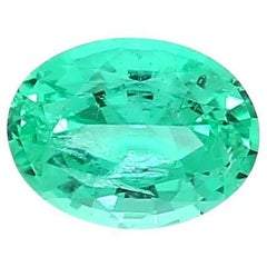 Used Oval Cut Emerald Loose Gemstone Ring 0.73 Carat Weight ICL Certified