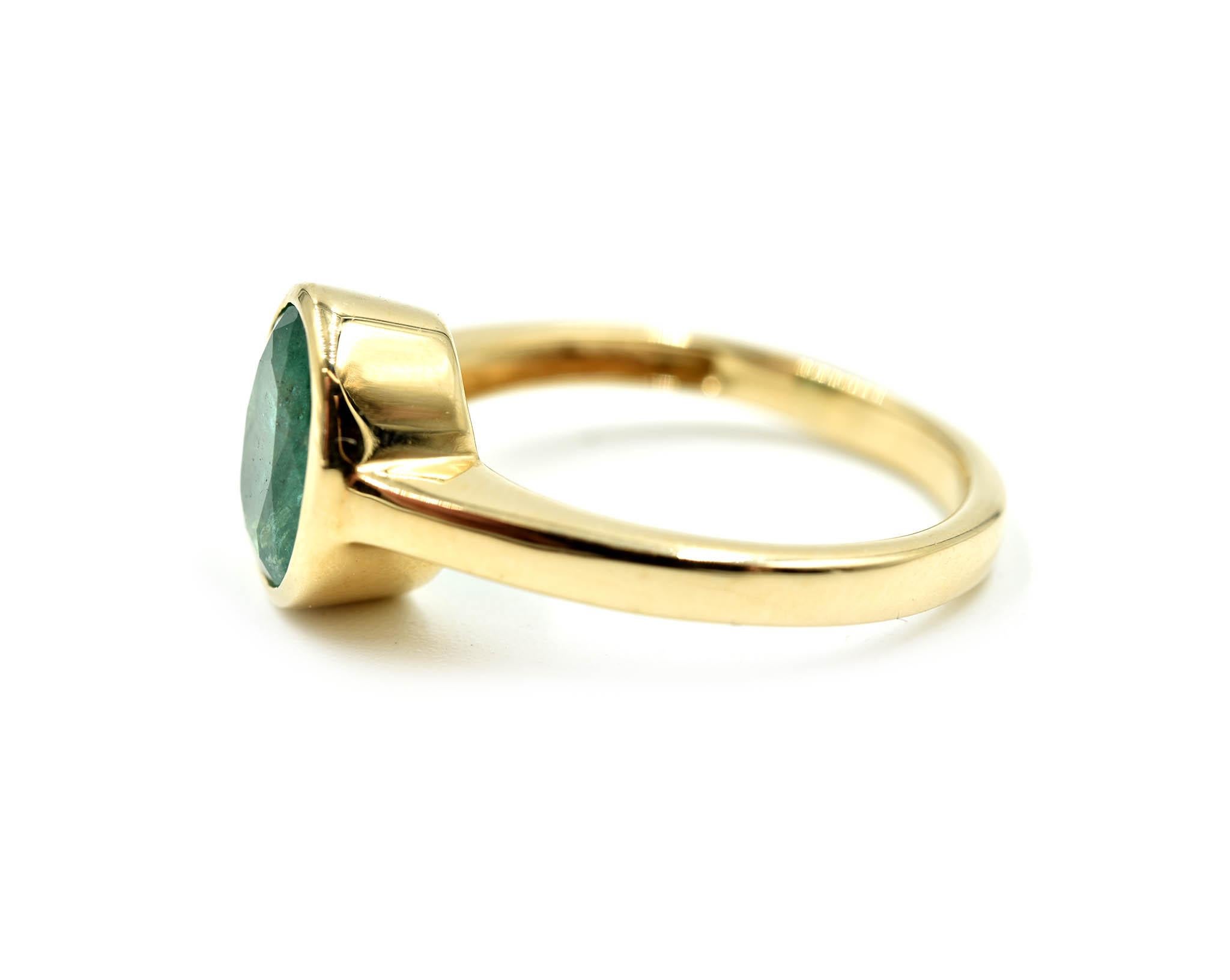 Modern Oval Cut Emerald Solitaire Ring 14 Karat Yellow Gold