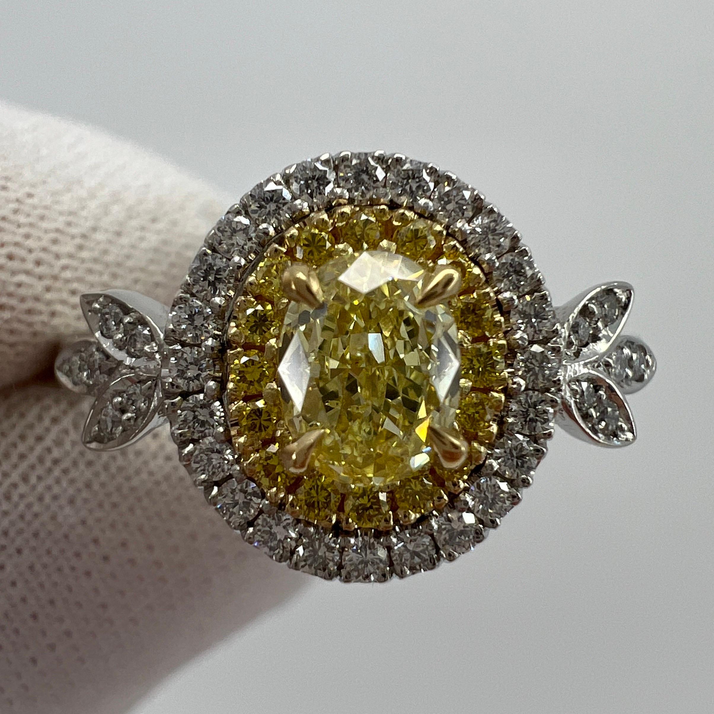 Oval Cut Fancy Yellow & White Diamond Platinum & 18k Yellow Gold Halo Ring.

A beautiful diamond halo ring with a stunning 0.45ct centre fancy yellow VS2 diamond, with an excellent oval cut. Accented by 0.15ct of round cut fancy vivid yellow VS2