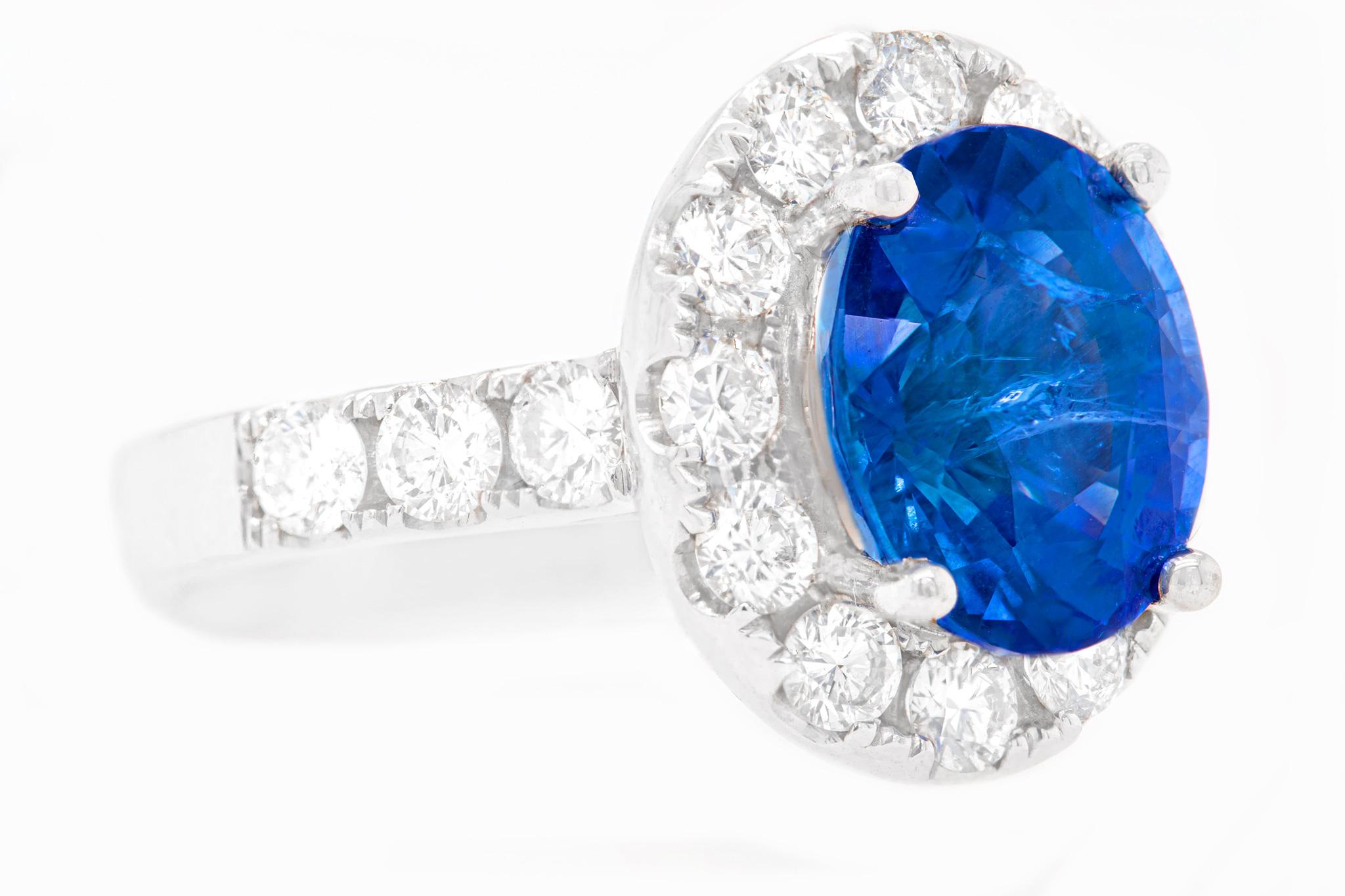 Contemporary Fine Sapphire 6.21 Carat Ring With Diamond Halo 1.54 Carats Total 18K Gold