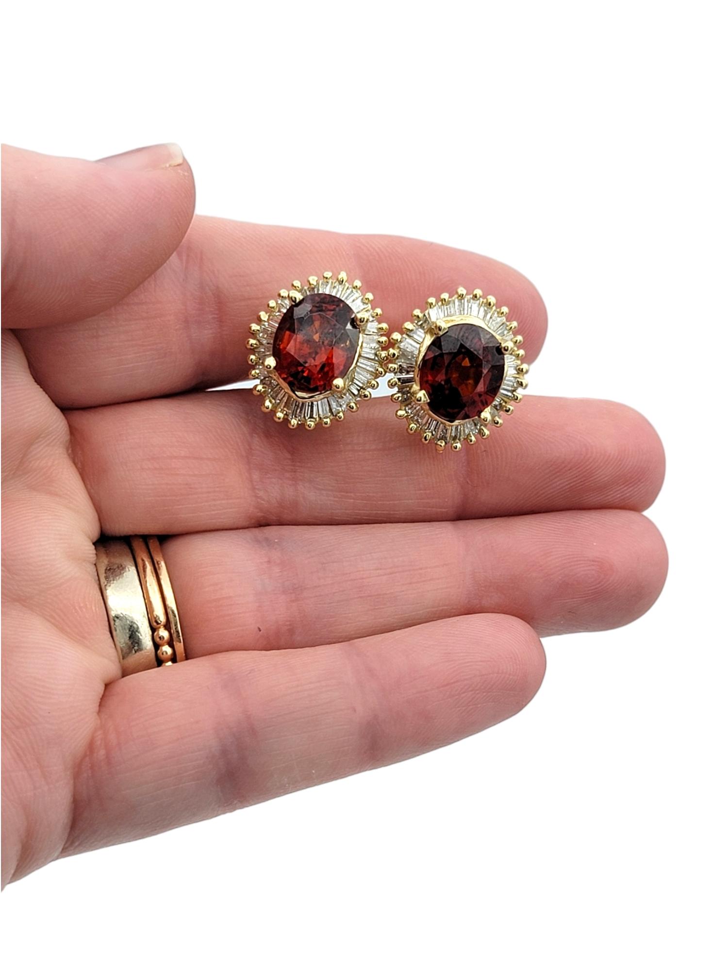 Oval Cut Garnet and Baguette Diamond Halo Stud Earrings in 14 Karat Yellow Gold For Sale 2