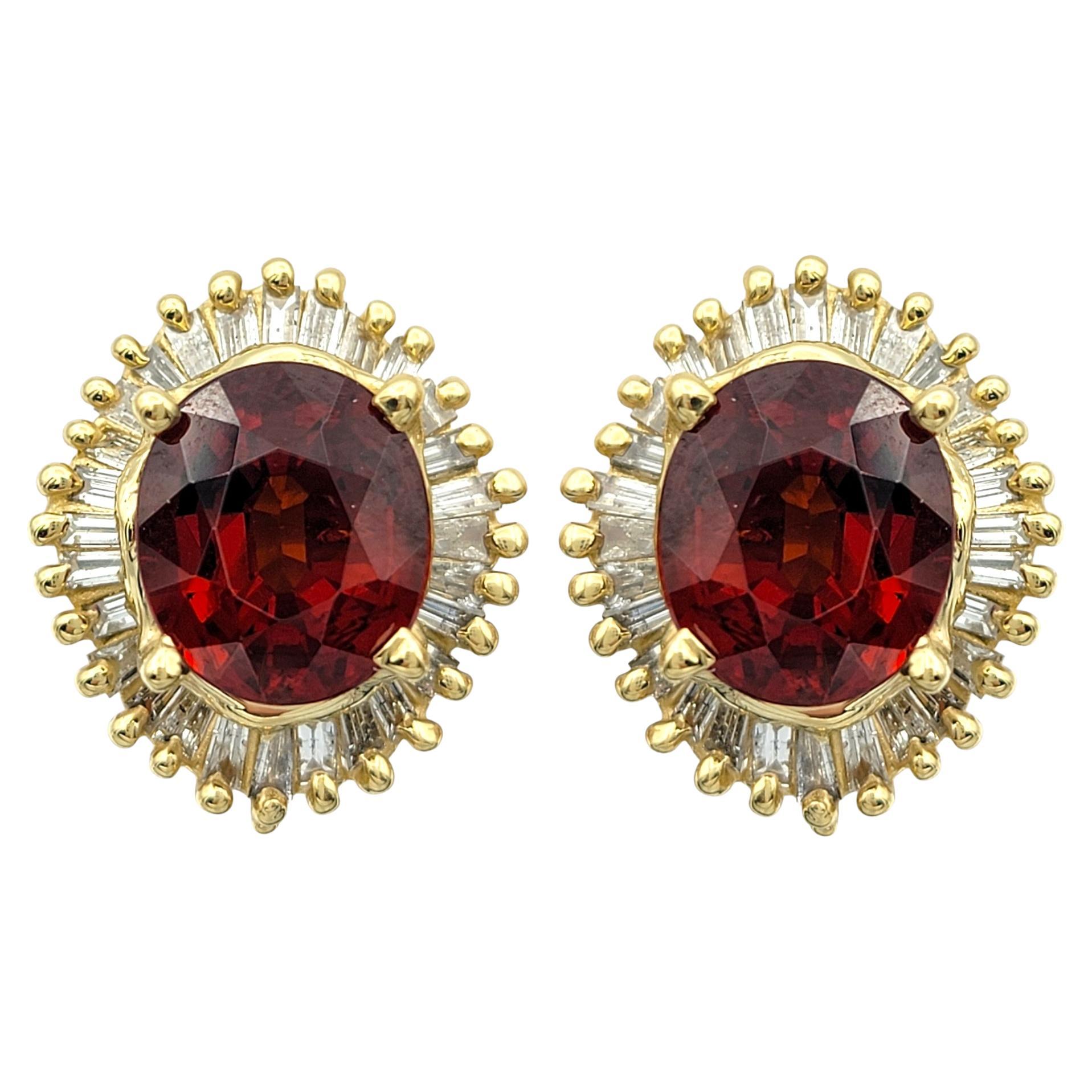 Oval Cut Garnet and Baguette Diamond Halo Stud Earrings in 14 Karat Yellow Gold For Sale