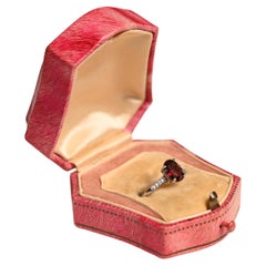 Anello di fidanzamento con granato taglio ovale (circa 1,60 carati) , oro bianco 14k