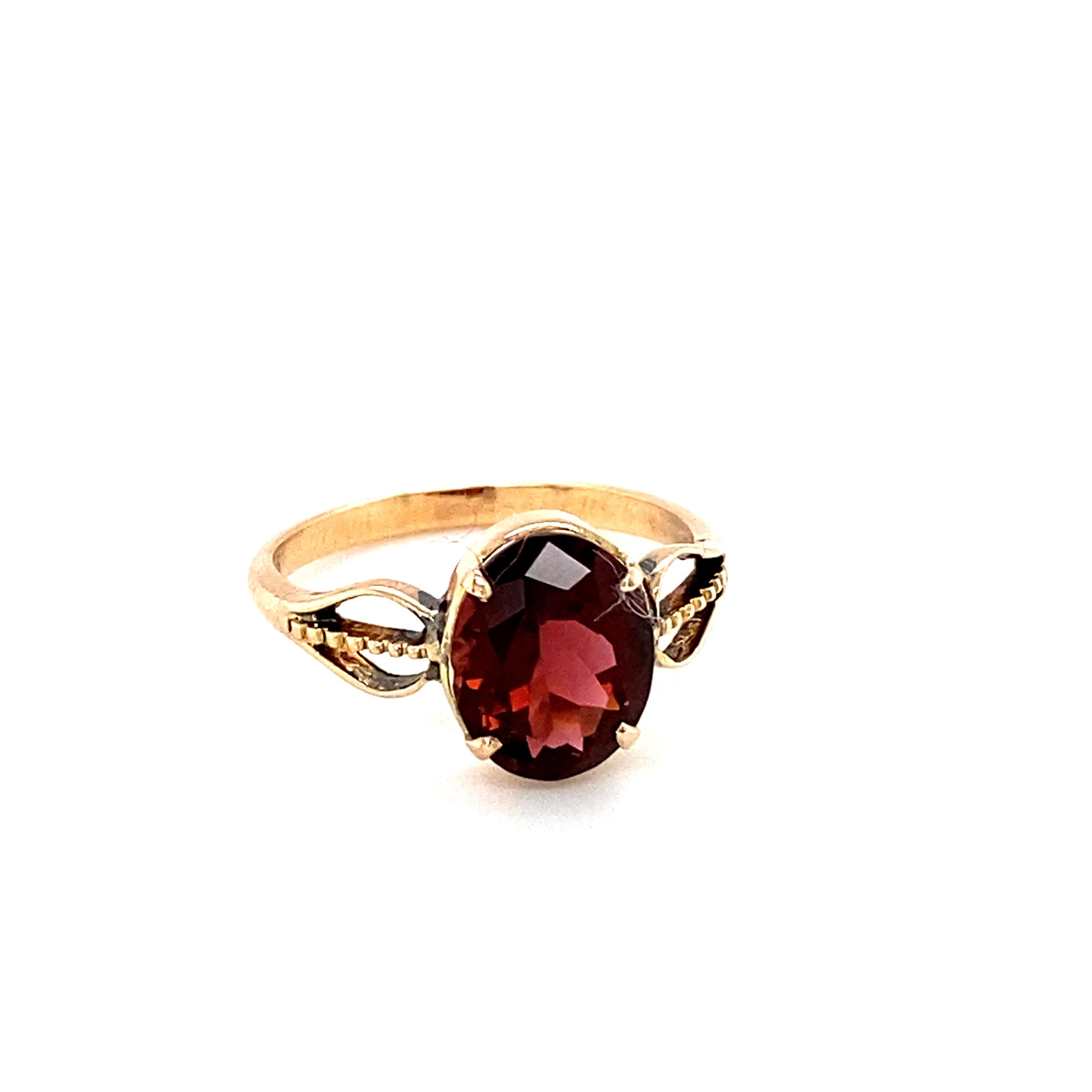 Artisan Oval Cut Garnet Yellow Gold Solitaire Ring For Sale