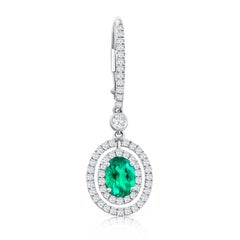 1.01 Carats Total Oval Cut Emerald and Diamond Halo Dangle Earrings