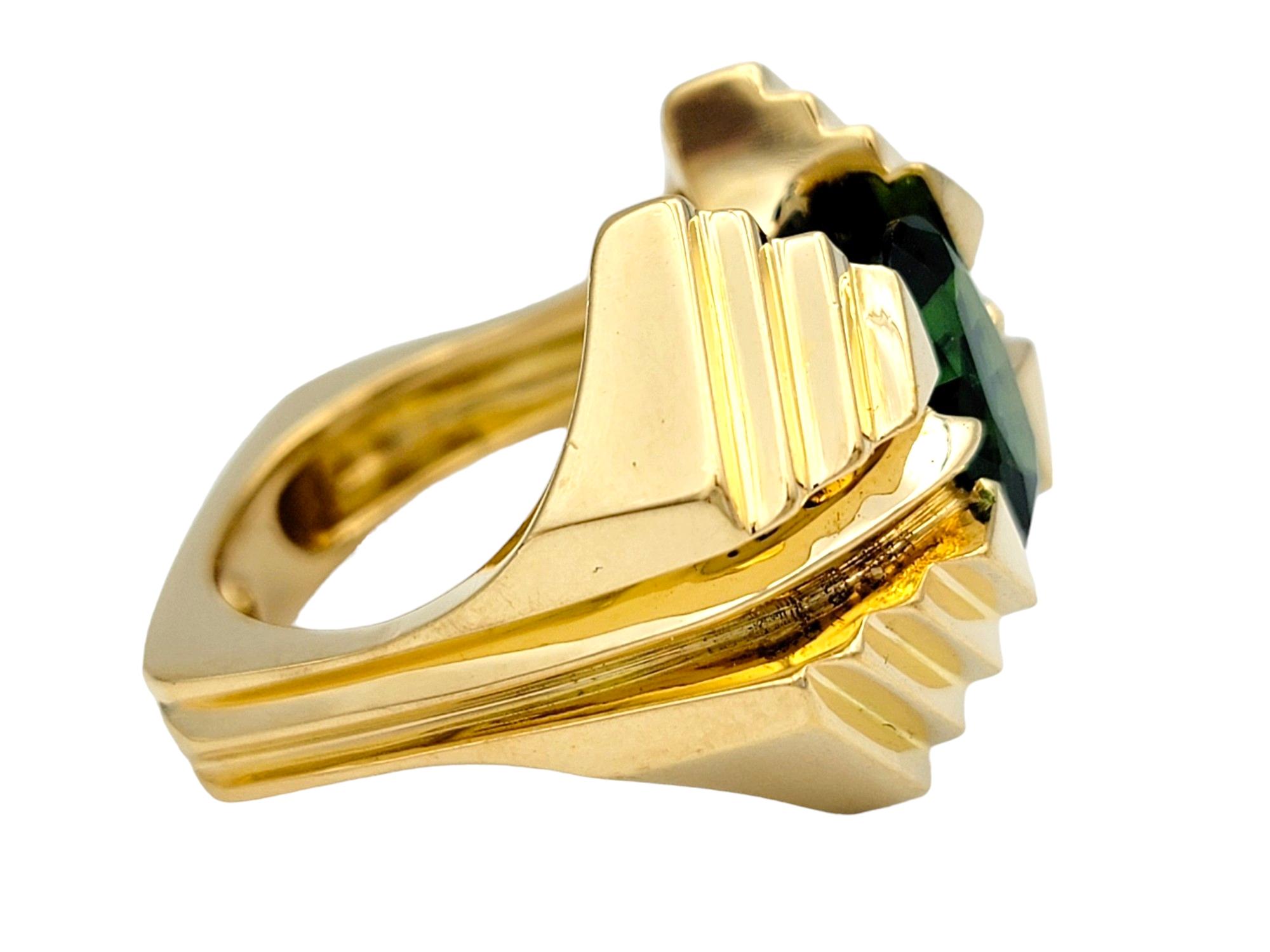 Contemporary Oval Cut Green Tsavorite Garnet Squared Ring Set in Ridged 18 Karat Yellow Gold For Sale