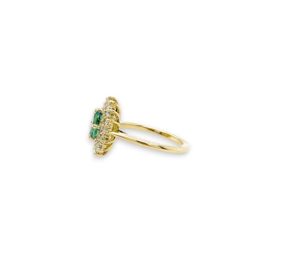 Artisan Oval Cut Halo Paraiba ring with double diamond halo in 18ct yellow gold For Sale