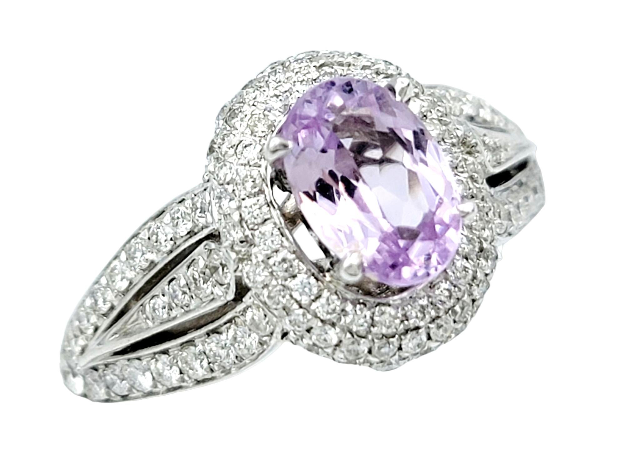 Ring Size: 7.25

This captivating cocktail ring is the epitome of elegance, a mesmerizing creation set in the refined embrace of 14 karat white gold. The centerpiece of this luxurious adornment is a luscious lavender purple spinel, expertly cut into