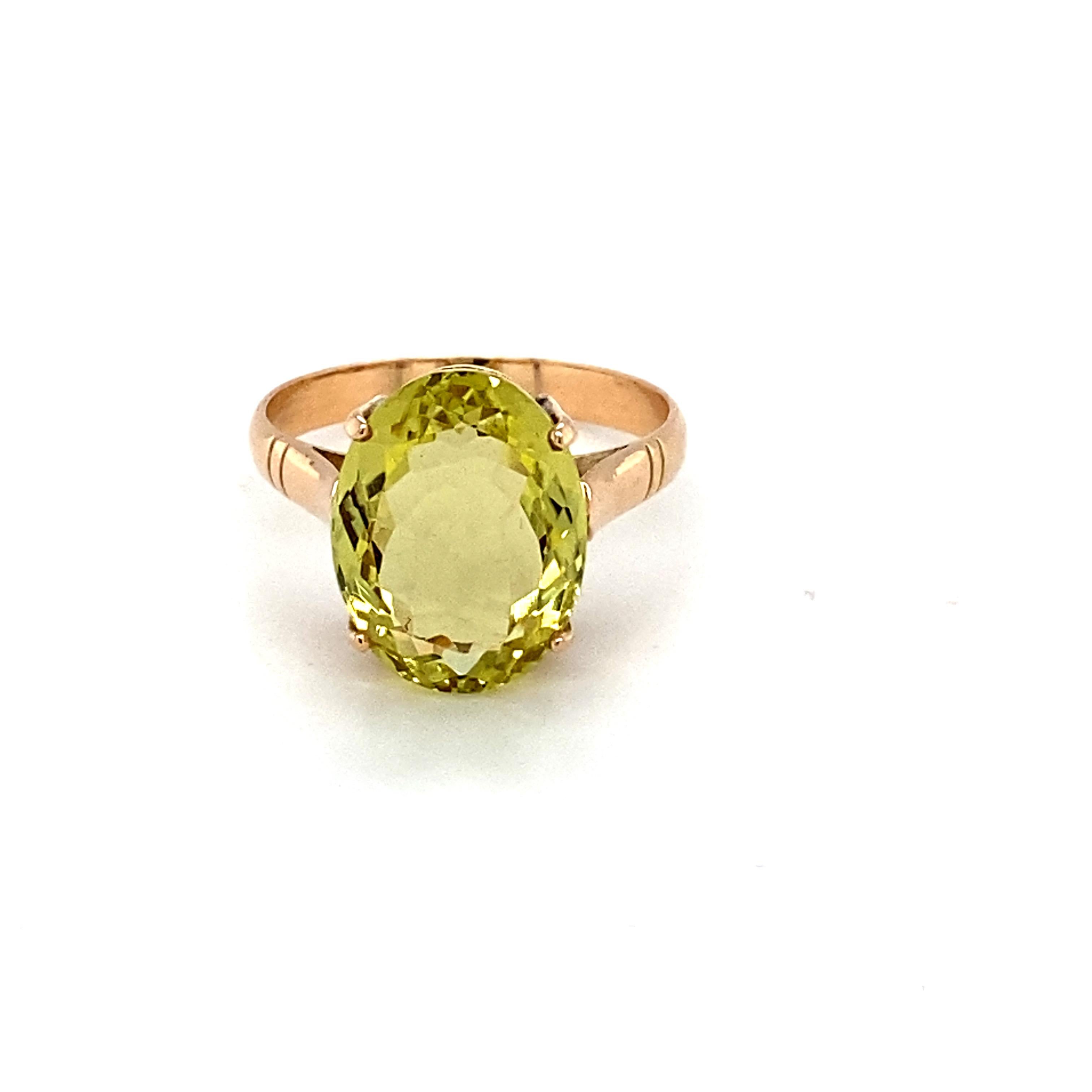 Oval cut lemon topaz is mounted in 14K yellow gold. Beautifully hand crafted with four prongs setting is gorgeous ring. Carefully chosen gem stone is hand cut and polished. One of a kind ring to suit your style. Its sleek and comfortable to