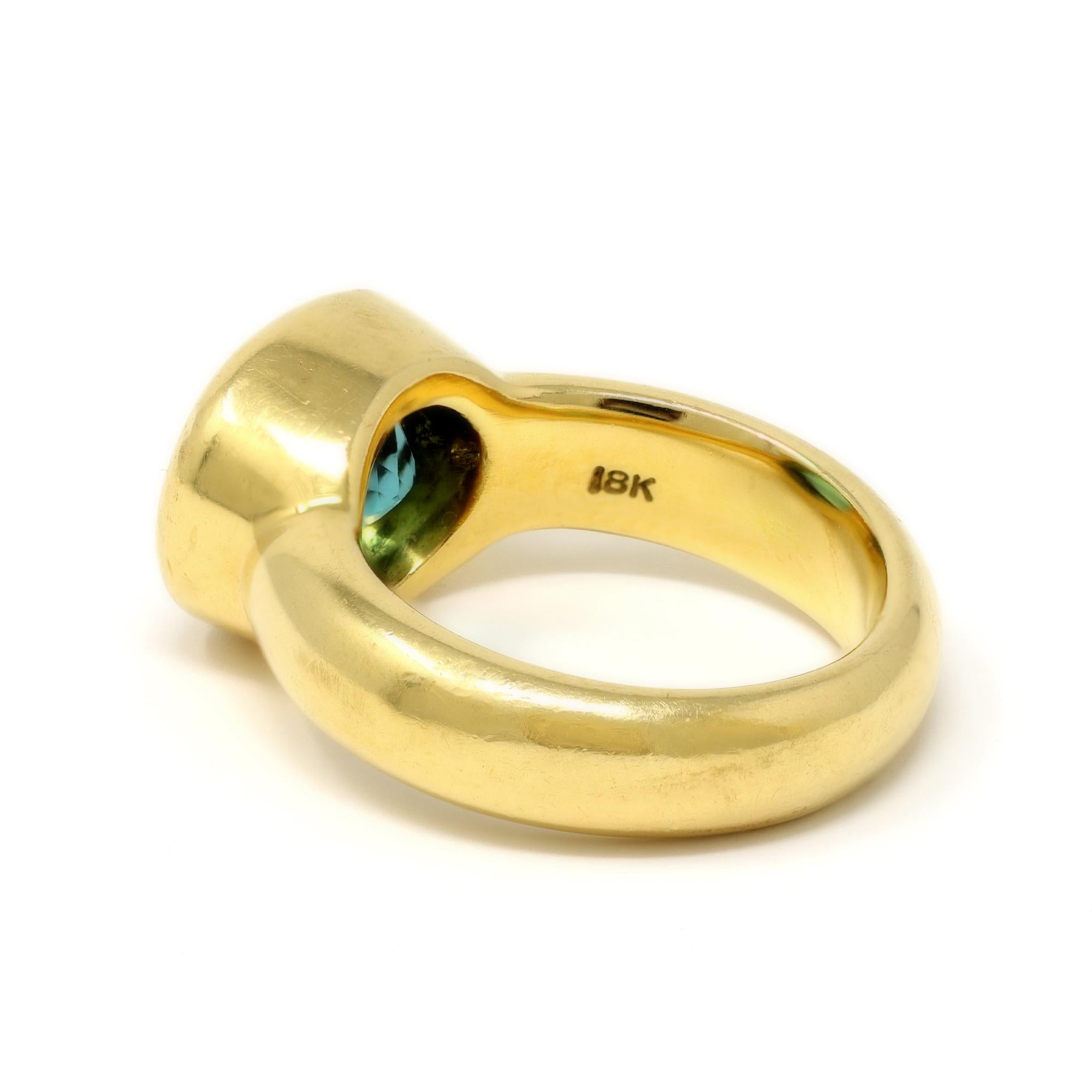Contemporary Oval-Cut Light Green Tourmaline Ring Set in 18k Yellow Gold For Sale