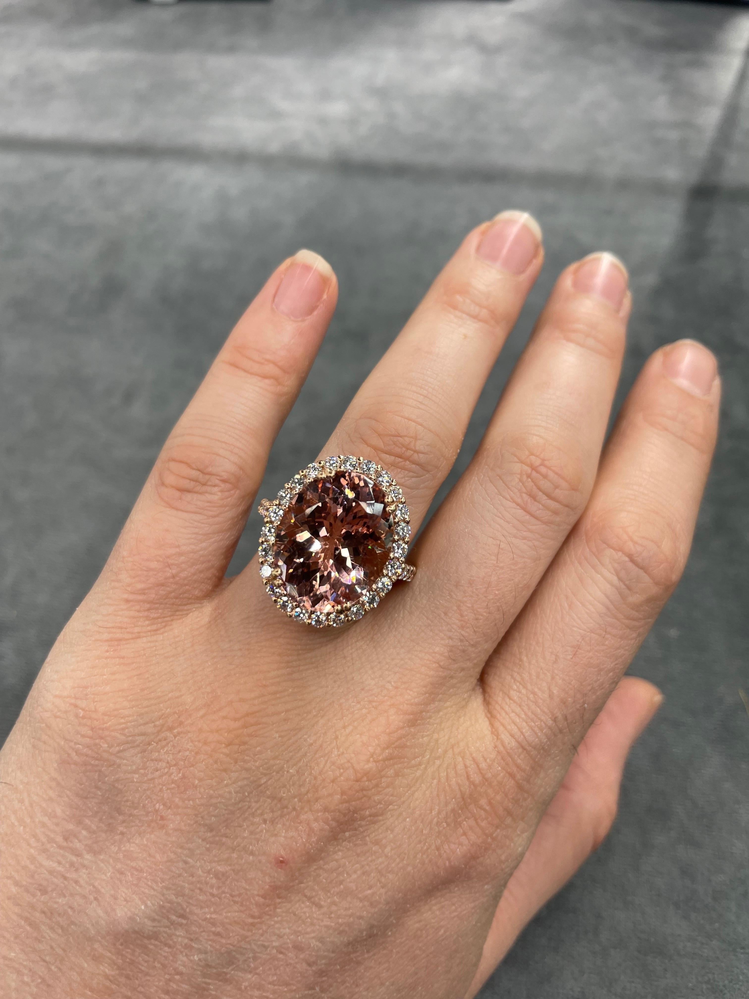 18 Karat Rose Gold cocktail ring featuring one Pink Salmon color Morganite weighing 11.62 Carats flanked with 34 round brilliants weighing 1.37 carats.

Morganite Measurements:
L: 17.8 MM
W: 14.6 MM

DOUBLE CHECK
Diamond Halo
L: 22.1 MM
W: 18.2 MM
