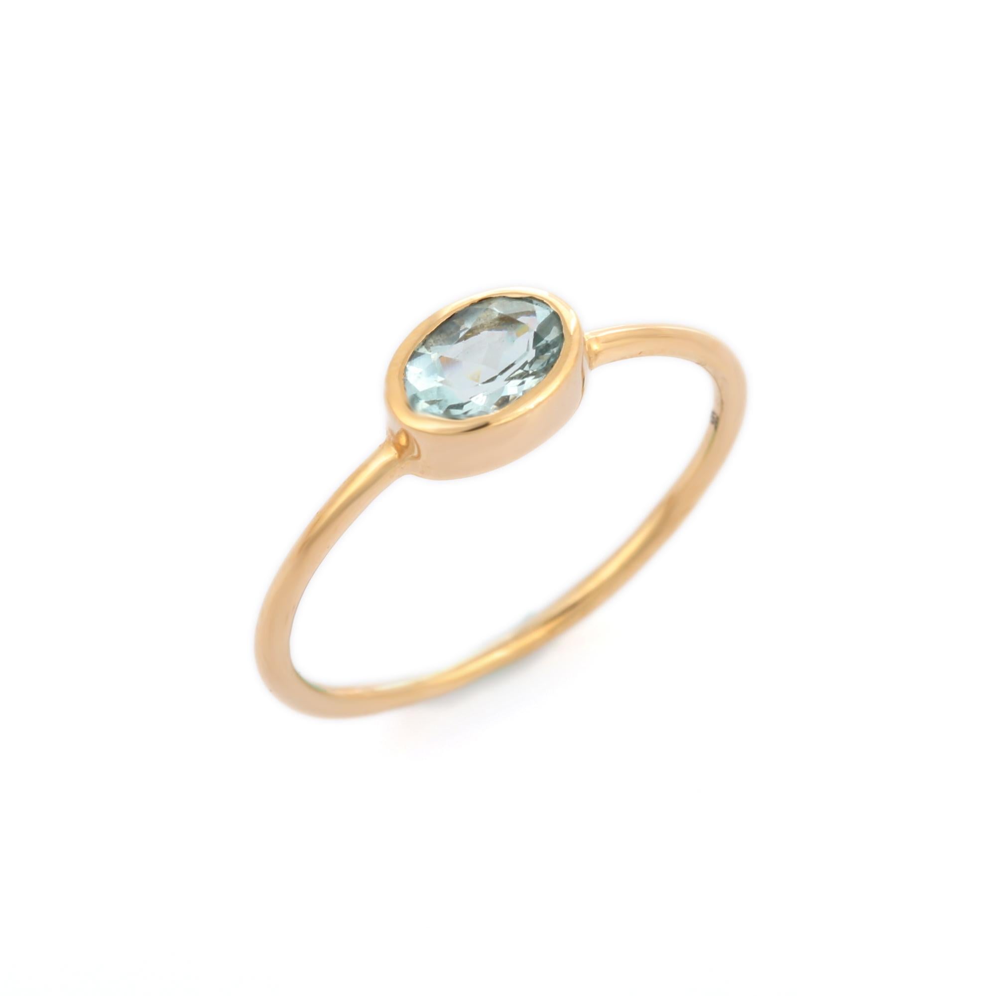 For Sale:  Oval Cut Natural Aquamarine Solitaire Ring in 14K Yellow Gold 9