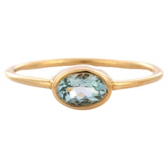 Oval Cut Natural Aquamarine Solitaire Ring in 14K Yellow Gold