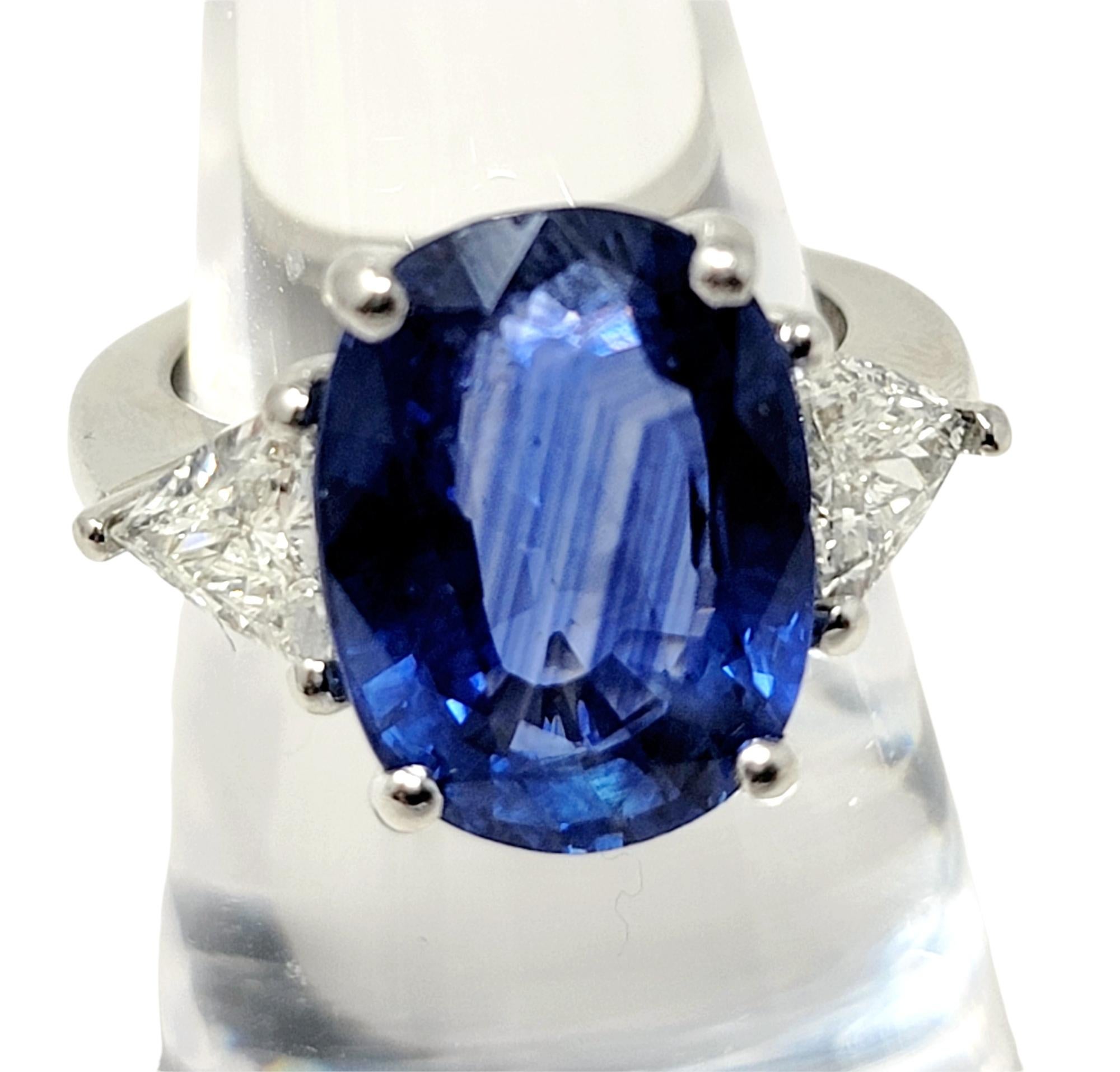 Oval Cut Natural Ceylon Blue Sapphire and Trillion Diamond Platinum 3 Stone Ring In Good Condition For Sale In Scottsdale, AZ