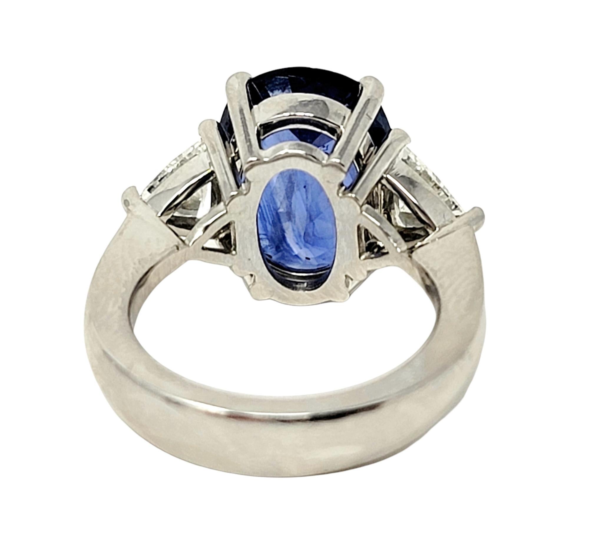 Oval Cut Natural Ceylon Blue Sapphire and Trillion Diamond Platinum 3 Stone Ring For Sale 2