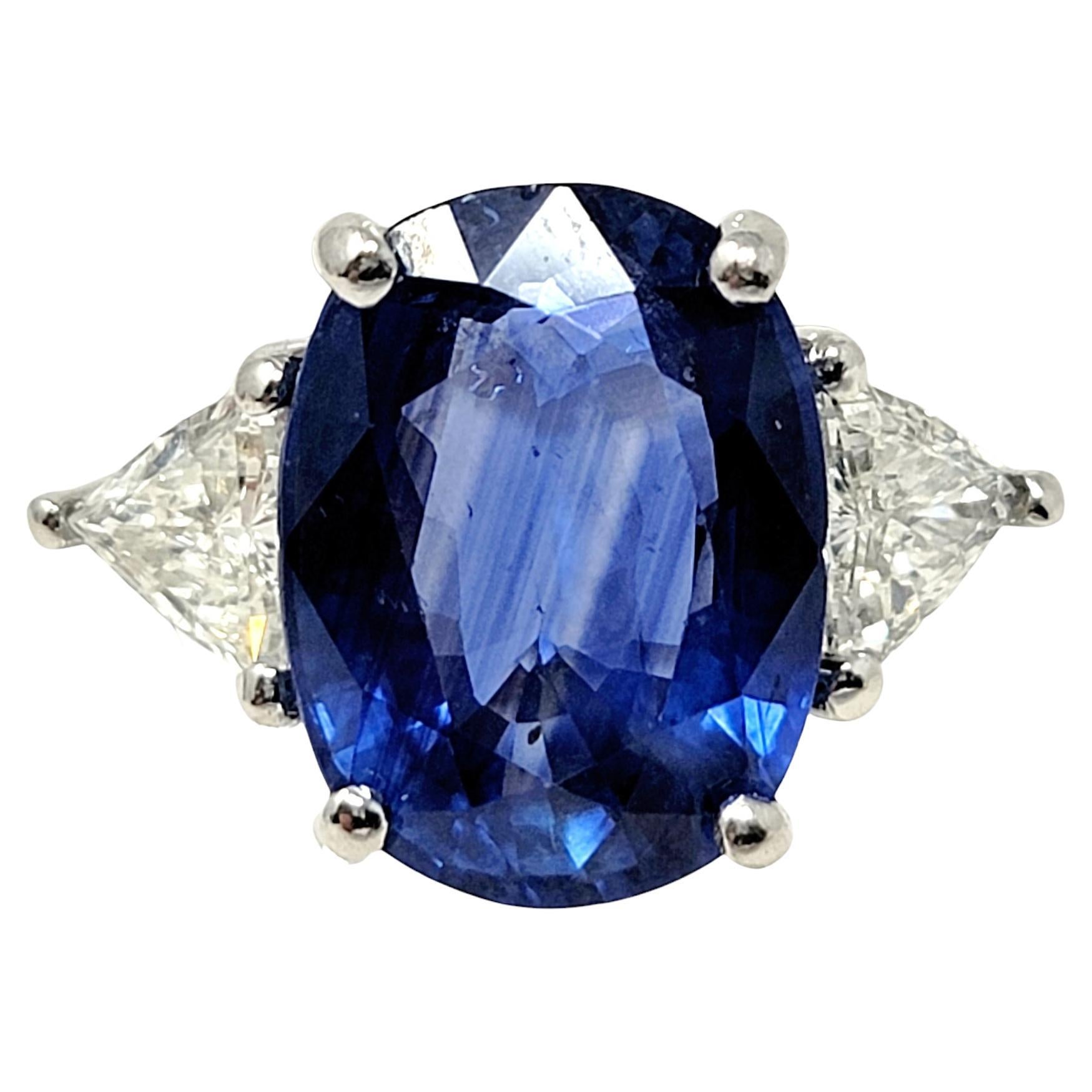 Oval Cut Natural Ceylon Blue Sapphire and Trillion Diamond Platinum 3 Stone Ring For Sale