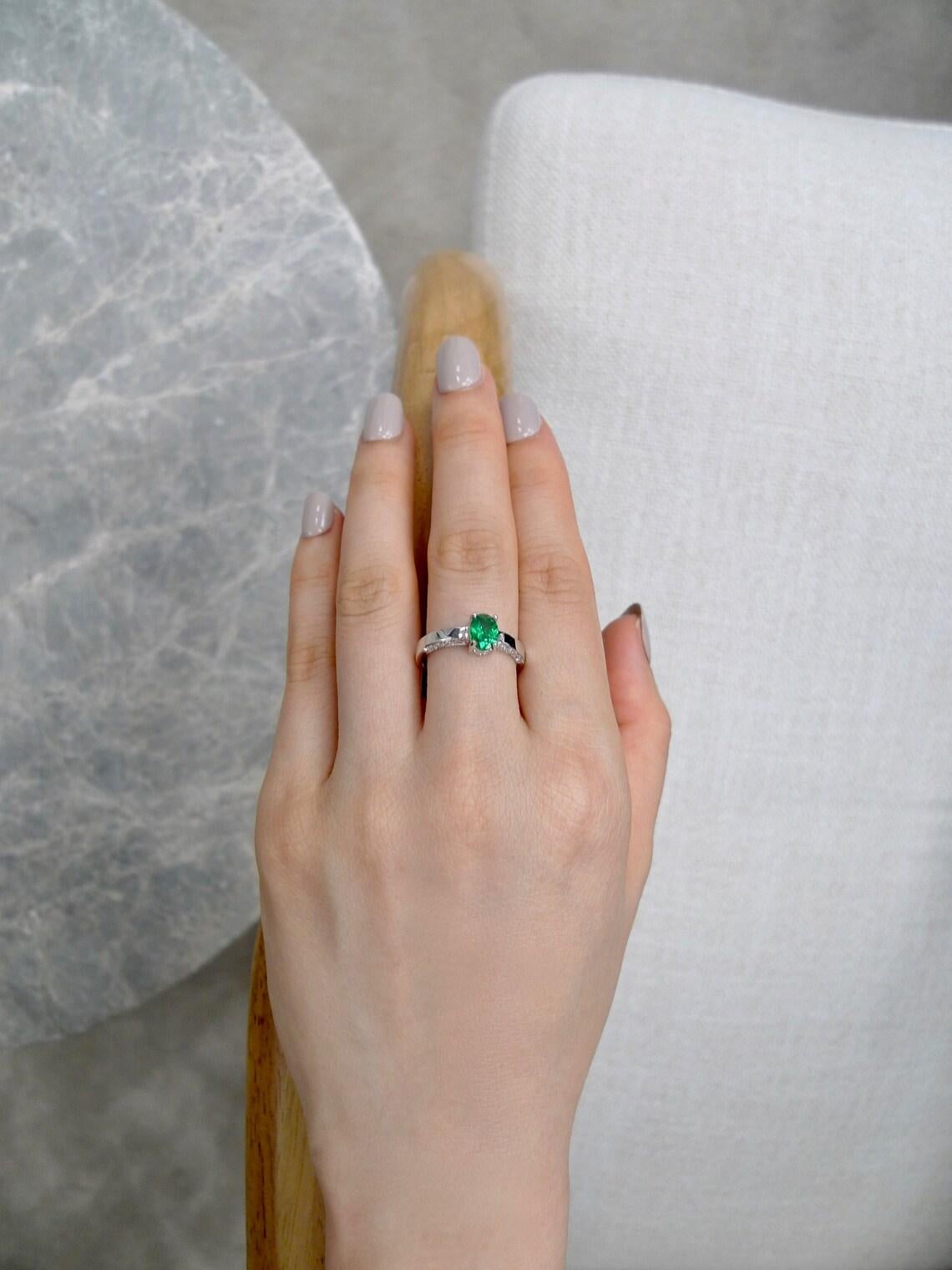 For Sale:  Oval Cut Natural Emerald and Round Brilliant Cut Diamond Engagement Ring 2